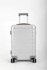 FPM Milano Bank Spinner, Durable and Luxurious Luggage Made in Italy, 4-wheel Spinner for Smooth Travel, Integrated TSA Lock, Fine Leather Straps ( Moonlight Silver , Carry-On 55M ) Moonlight Silver Carry On 55 M U1