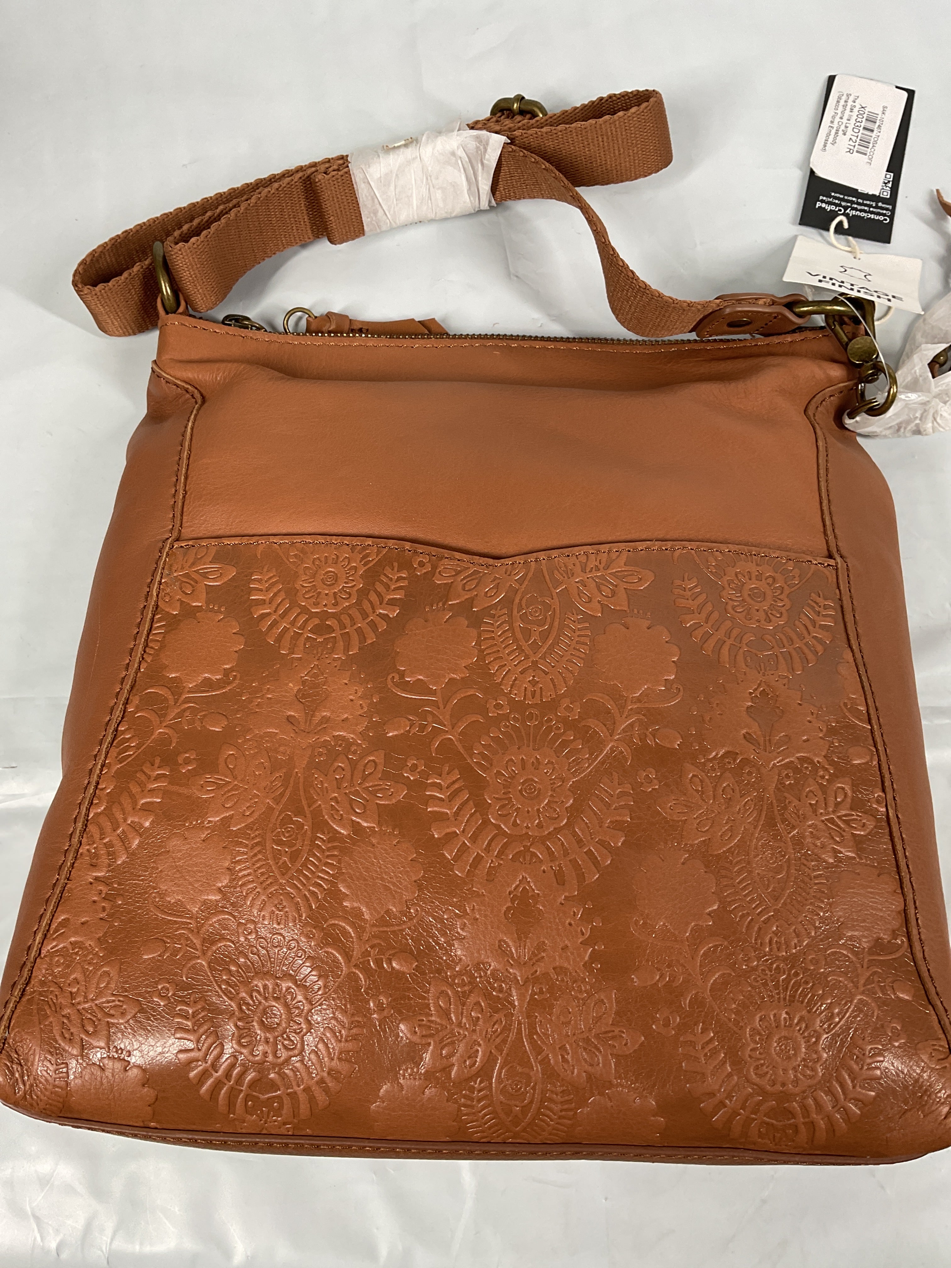 The Sak Lucia Crossbody Bag in Leather, Convertible Purse with Adjustable Strap, Tobacco Floral Embossed Tobacco Floral Emboss One Size U2