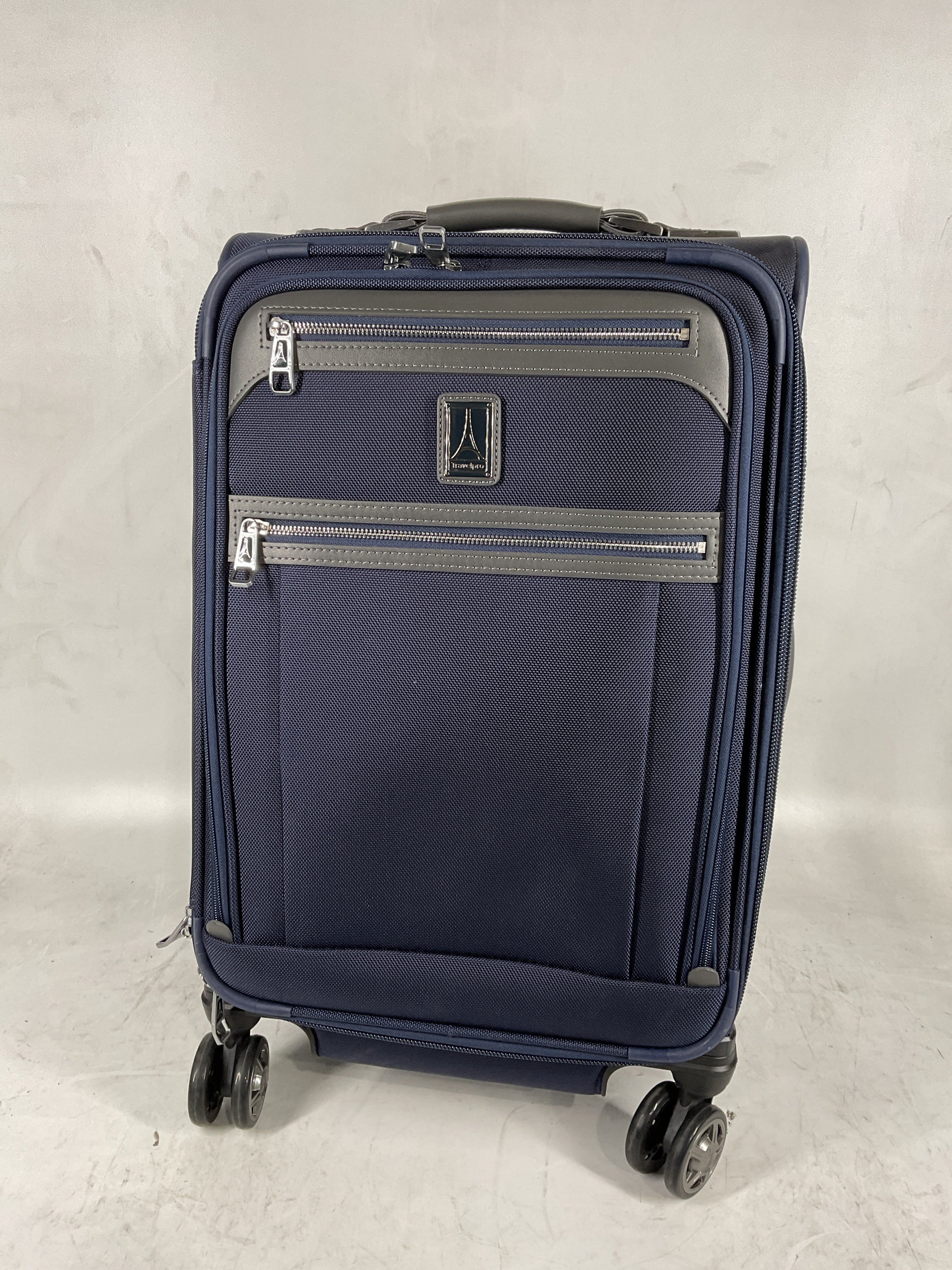 Travelpro Platinum Elite Softside Expandable Carry on Luggage, 8 Wheel Spinner Suitcase, USB Port, Suiter, Men and Women, Dark Blue, Carry On 21-Inch Dark Blue Carry-On 21-Inch U3