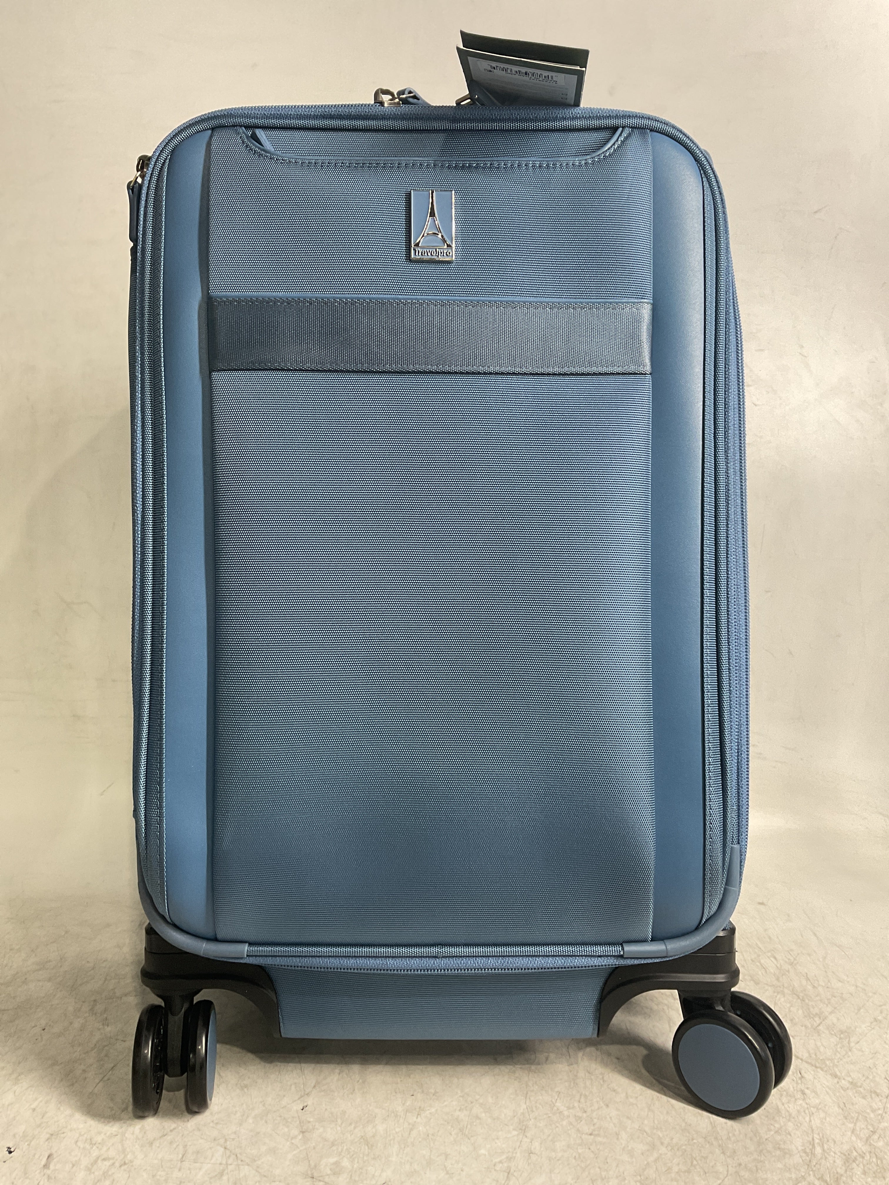 Travelpro VersaPack+ Lightweight Softside Expandable Carry on Luggage, 8 Spinner Suitcase, TSA Lock, Men and Women, Carry On 21-Inch, Elemental Blue Elemental Blue Carry On U1