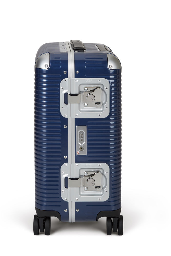 FPM Milano Bank Light Spinner, Durable Luxury Luggage Made in Italy, 4-Wheeled Smooth Dual Spinner Wheels, TSA Lock and Butterfly Clips for Safety ( Indigo Blue , 53 ) Indigo Blue 53 U1