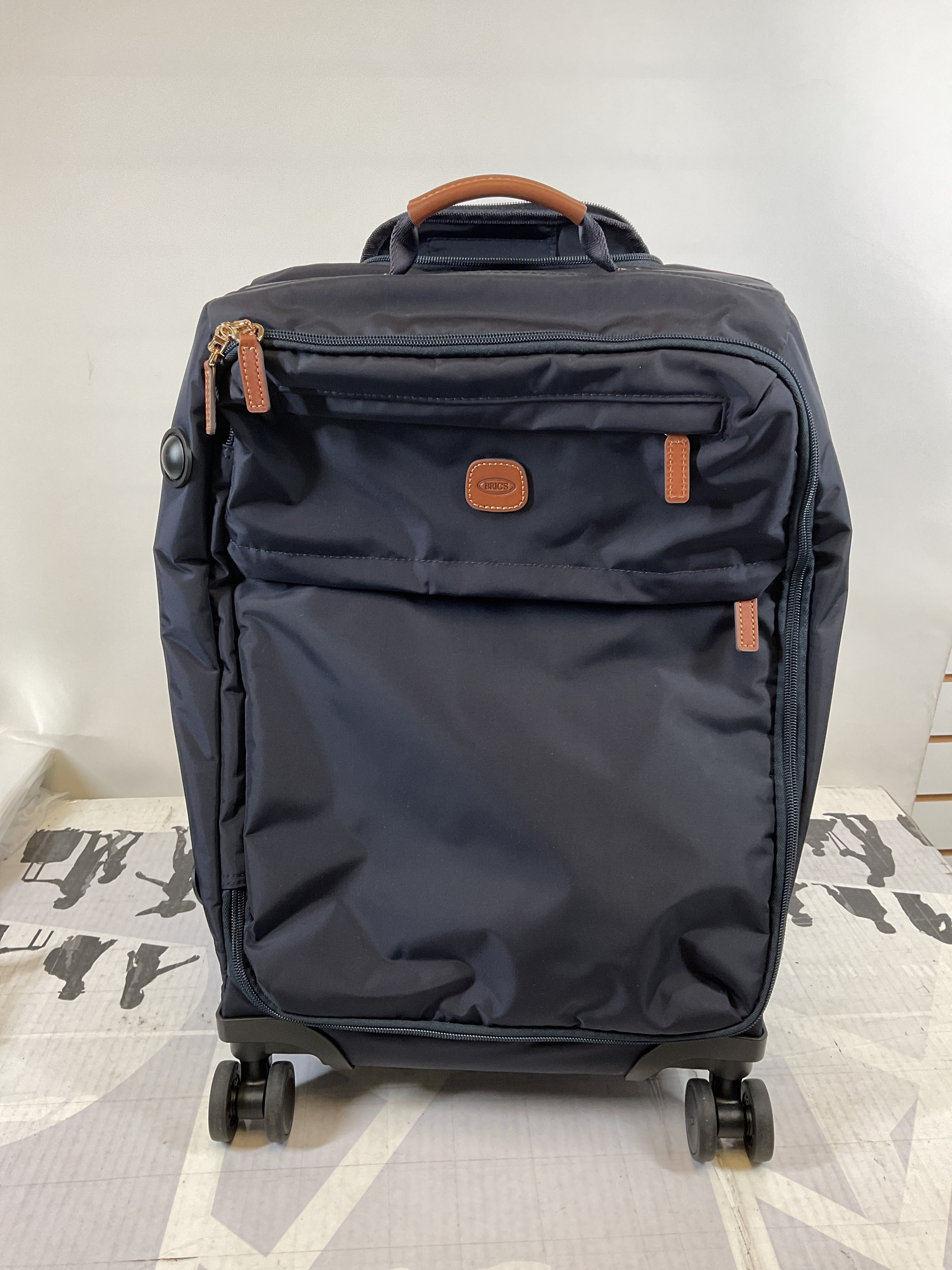 Bric's X-Travel 21 Carry-On Spinner Luxury Softside Luggage with 360 Wheels, Recycled Water-Resistant Fabric, Interior Pockets, and Leather Details ( Navy , One Size ) Navy One Size U2