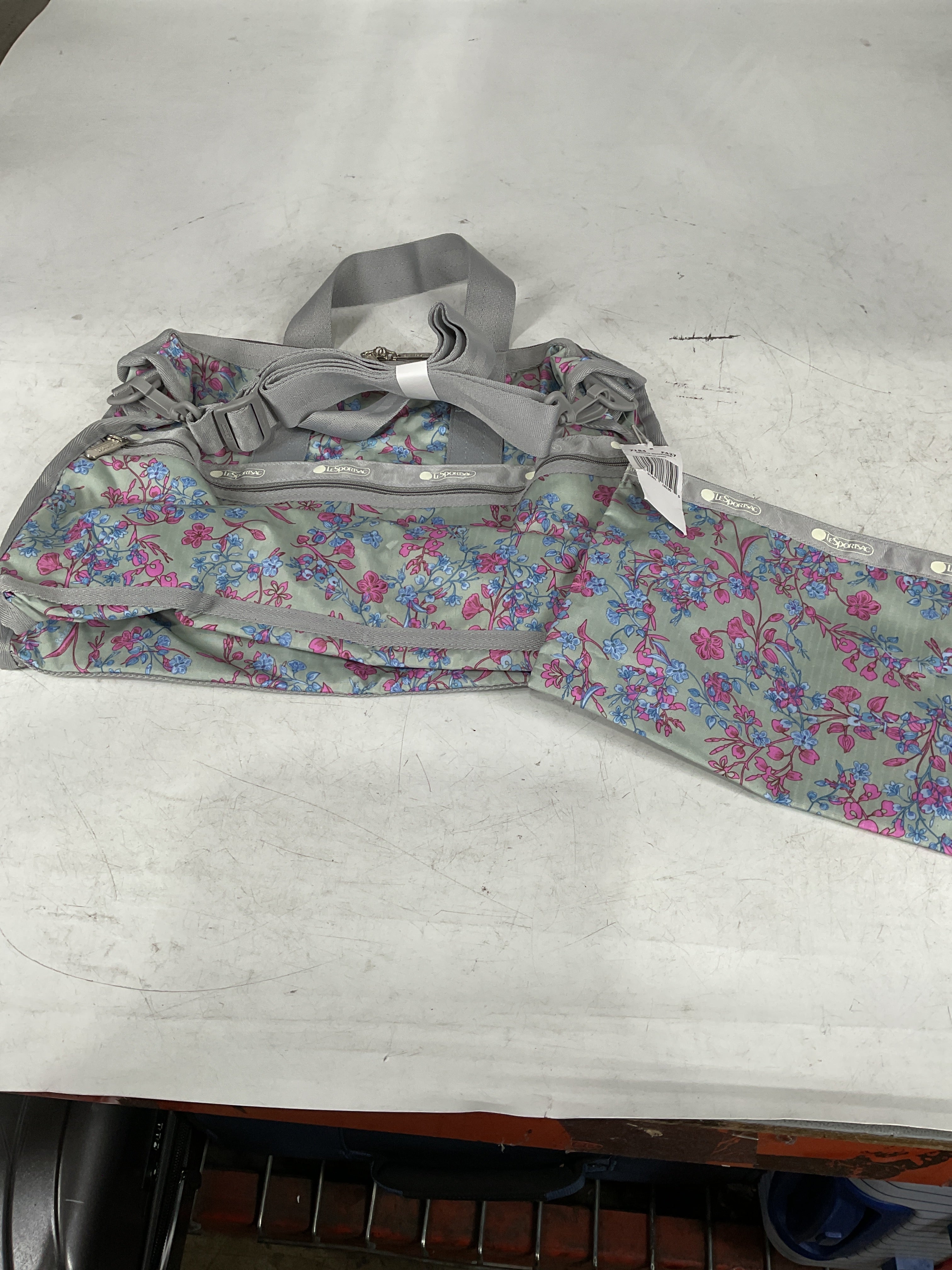 LeSportsac Laelia Mint Medium Weekender Crossbody Bag + Cosmetic Bag, Style 7184/Color F427, Celadon Mint Green Bag w Multi-color Laelia Orchids U1