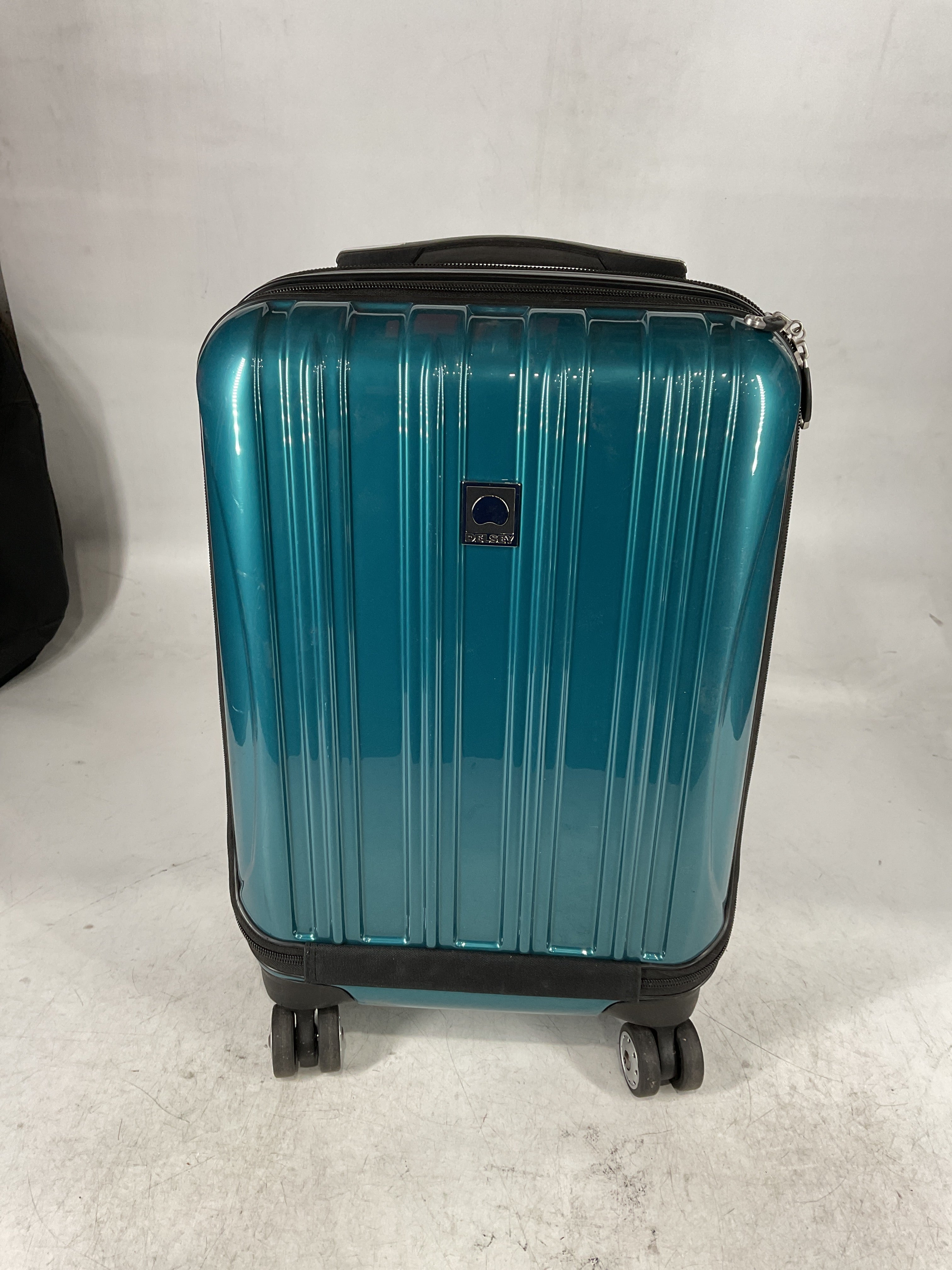 DELSEY Paris Helium Aero Hardside Expandable Luggage with Spinner Wheels Teal Carry On 19 Inch U6