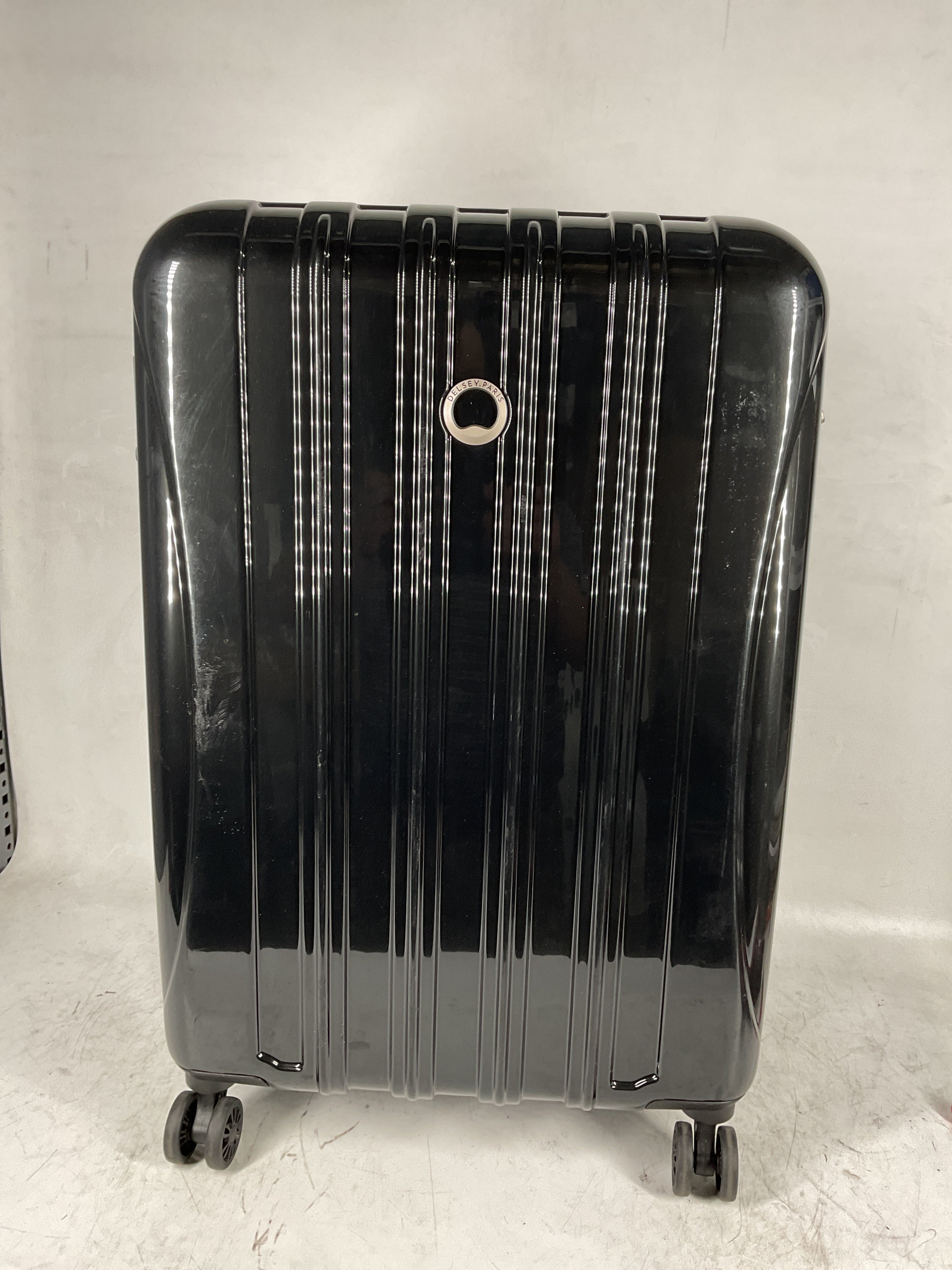DELSEY Paris Helium Aero Hardside Expandable Luggage with Spinner Wheels Black Checked Medium 25 Inch U19