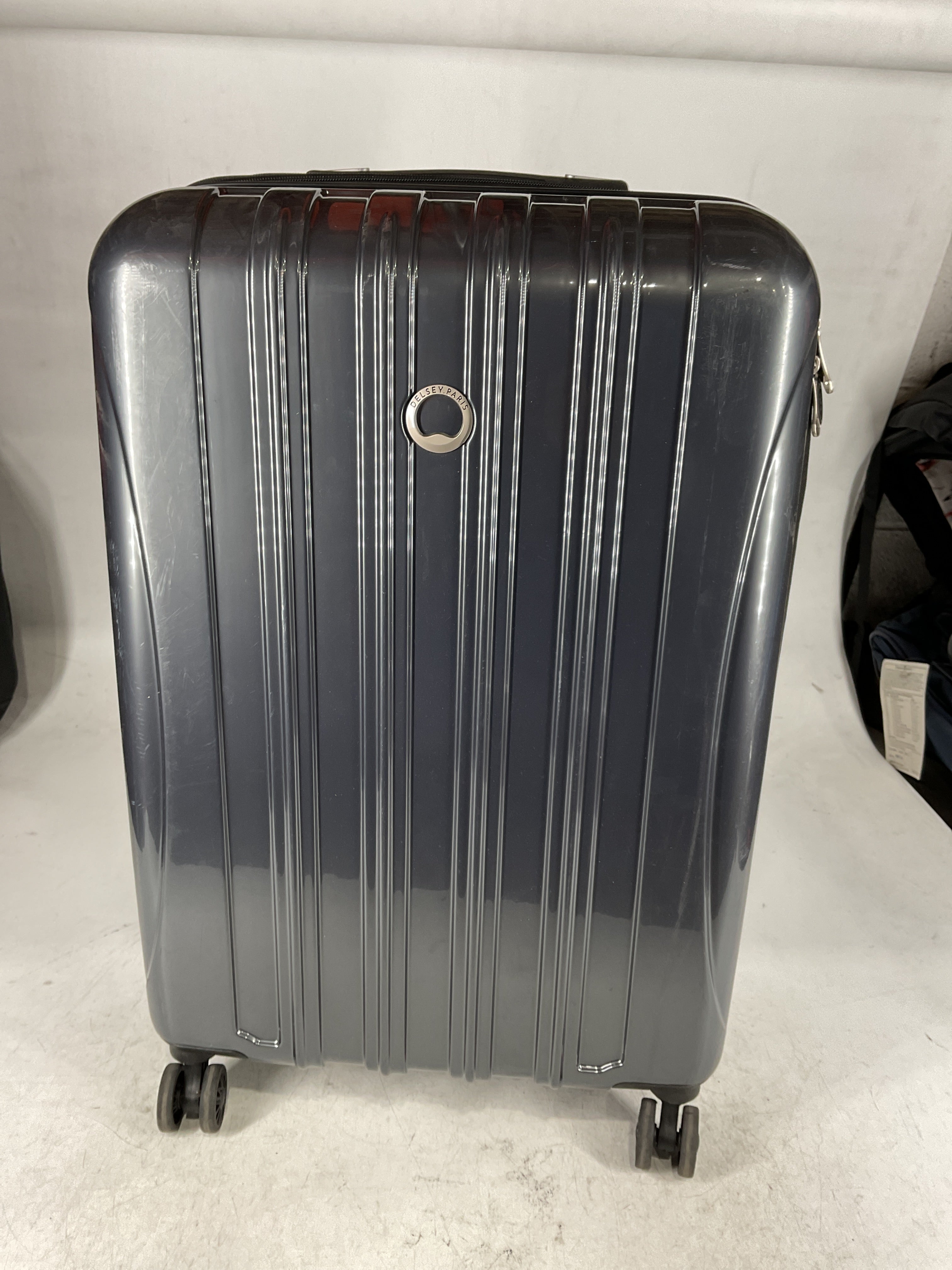 DELSEY Paris Helium Aero Hardside Expandable Luggage with Spinner Wheels Brushed Charcoal Checked Medium 25 Inch U3