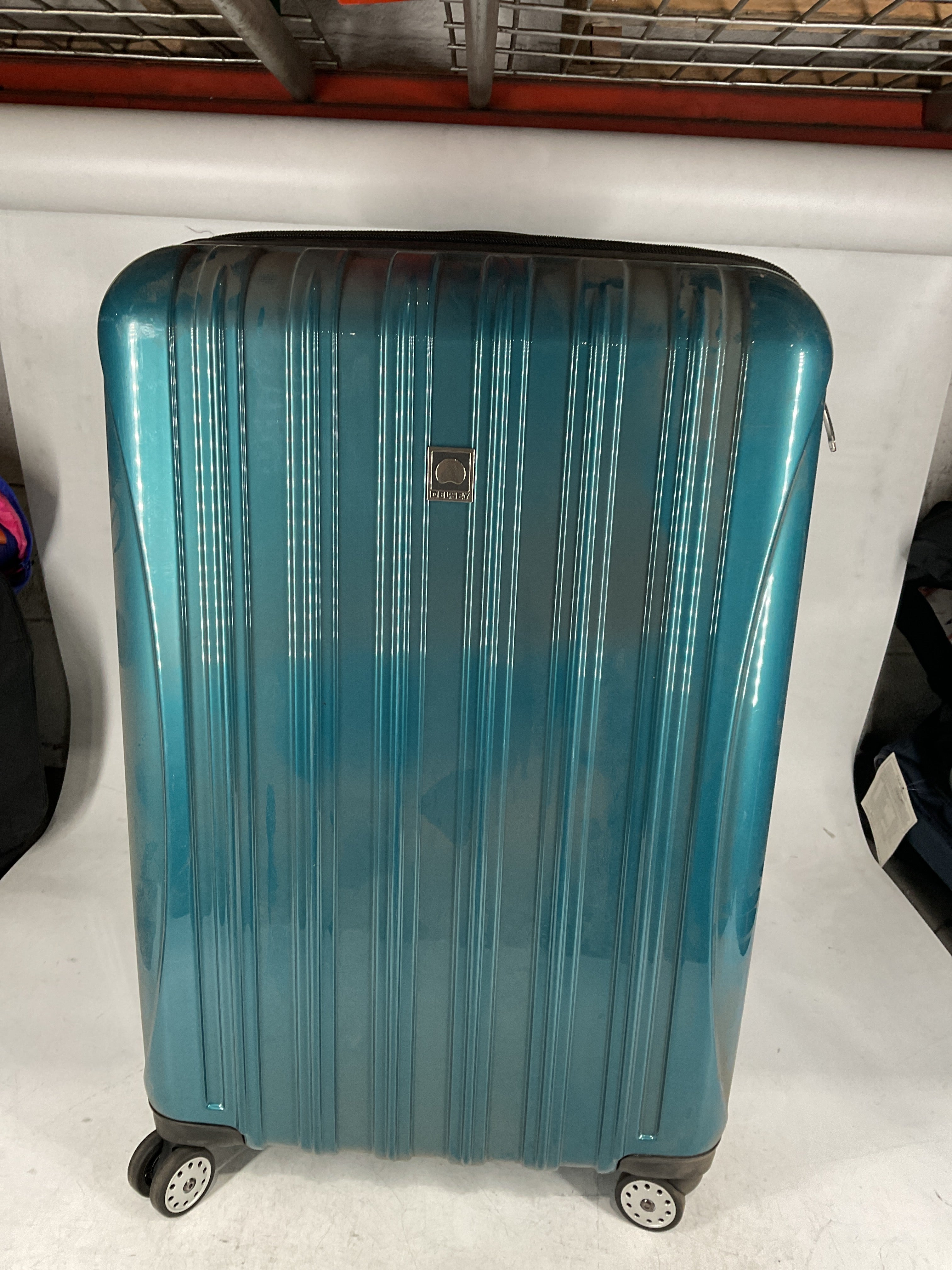 DELSEY Paris Helium Aero Hardside Expandable Luggage with Spinner Wheels Teal Checked Large 29 Inch U10