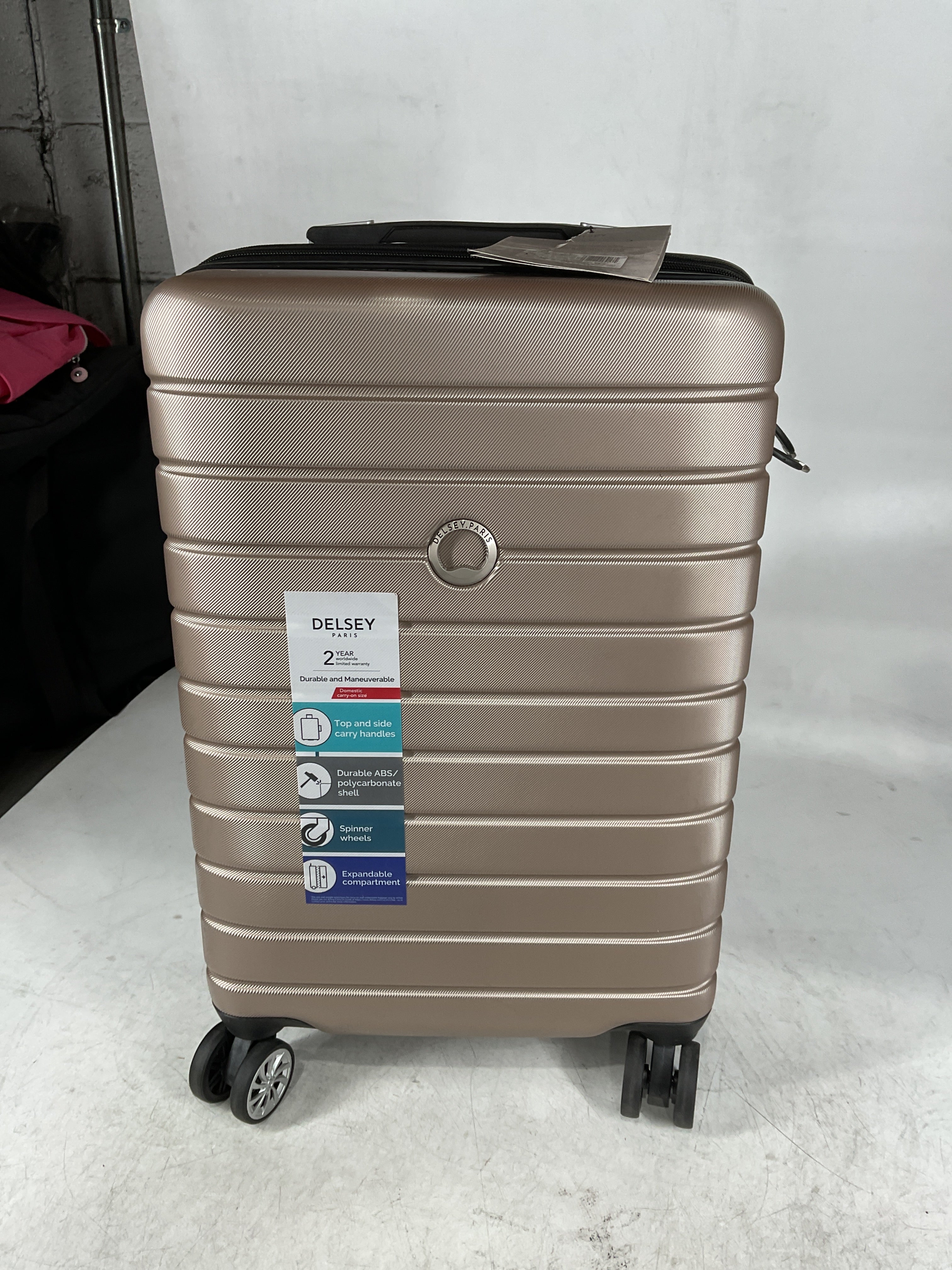DELSEY Paris Jessica Hardside Expandable Luggage with Spinner Wheels Rose Gold Carry On 21 Inch U11