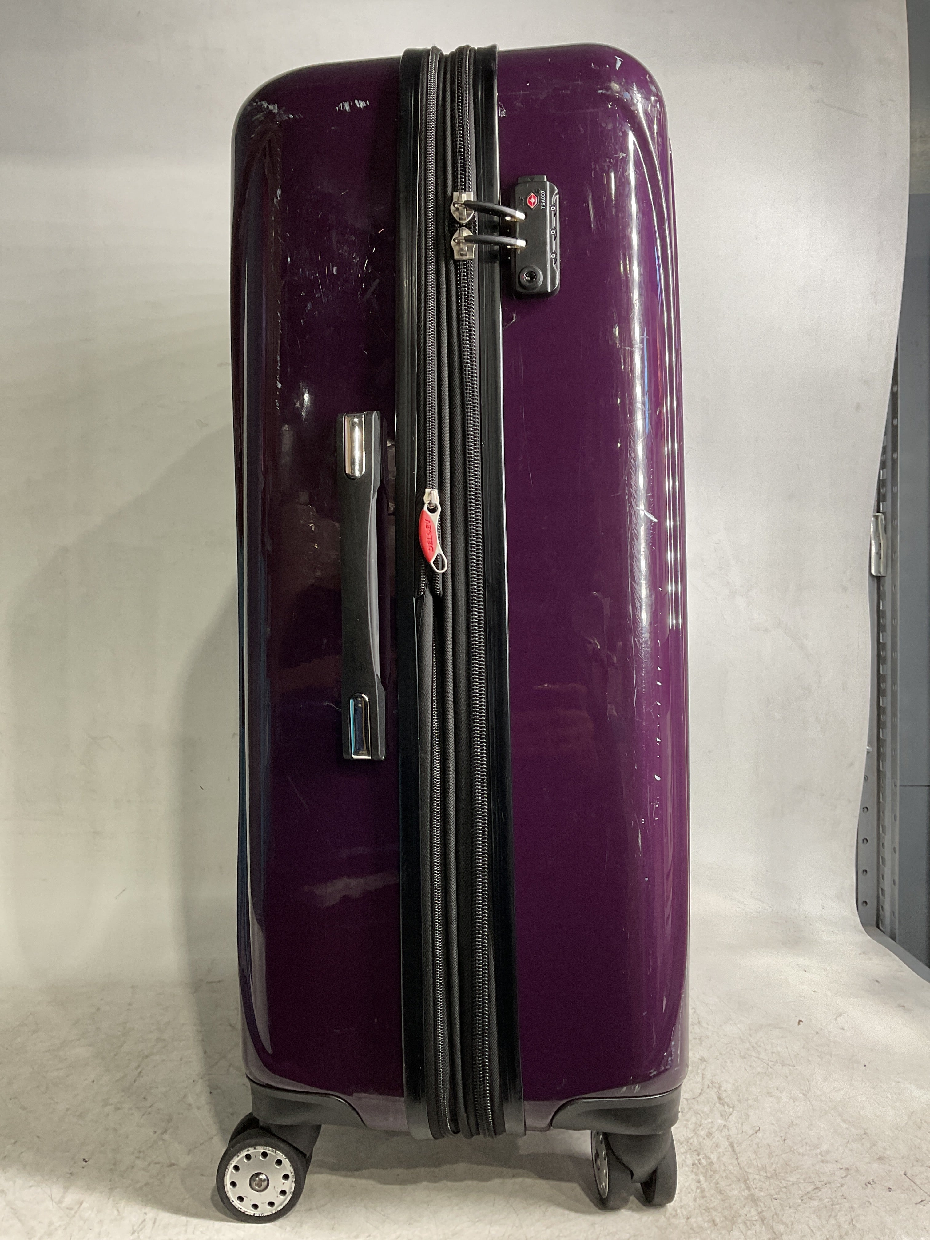 DELSEY Paris Helium Aero Hardside Expandable Luggage with Spinner Wheels ( Plum , Checked-Large 29 Inch ) Plum Checked Large 29 Inch U2