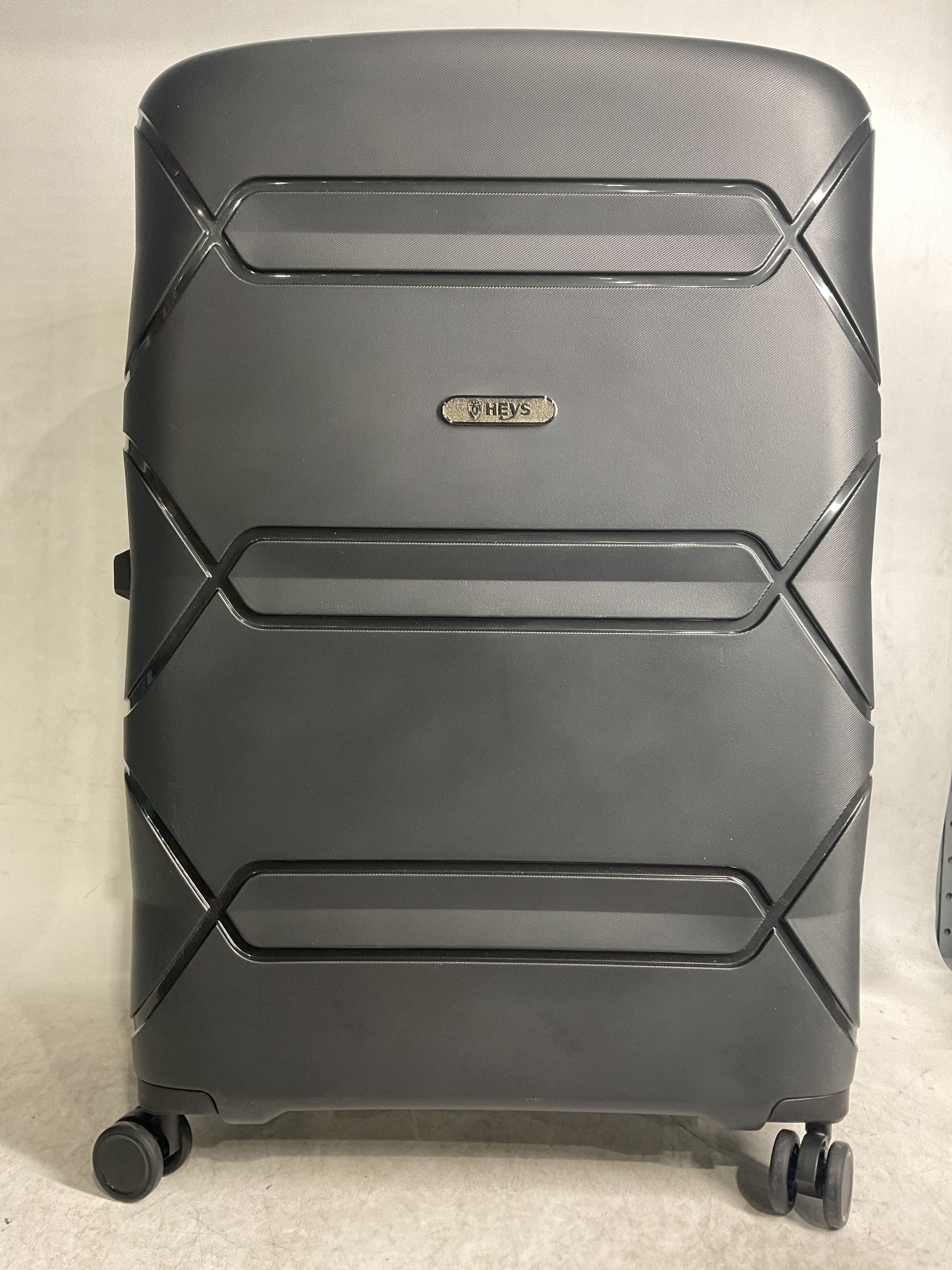 Heys Milos Durable and lightweight luggage, made with Duraflex impact-resistant material, TSA Combination Lock, Dual Spinner Wheels, and Expandable ( Black , 30-Inch Checked-Large ) Black 30 Inch Checked Large U1