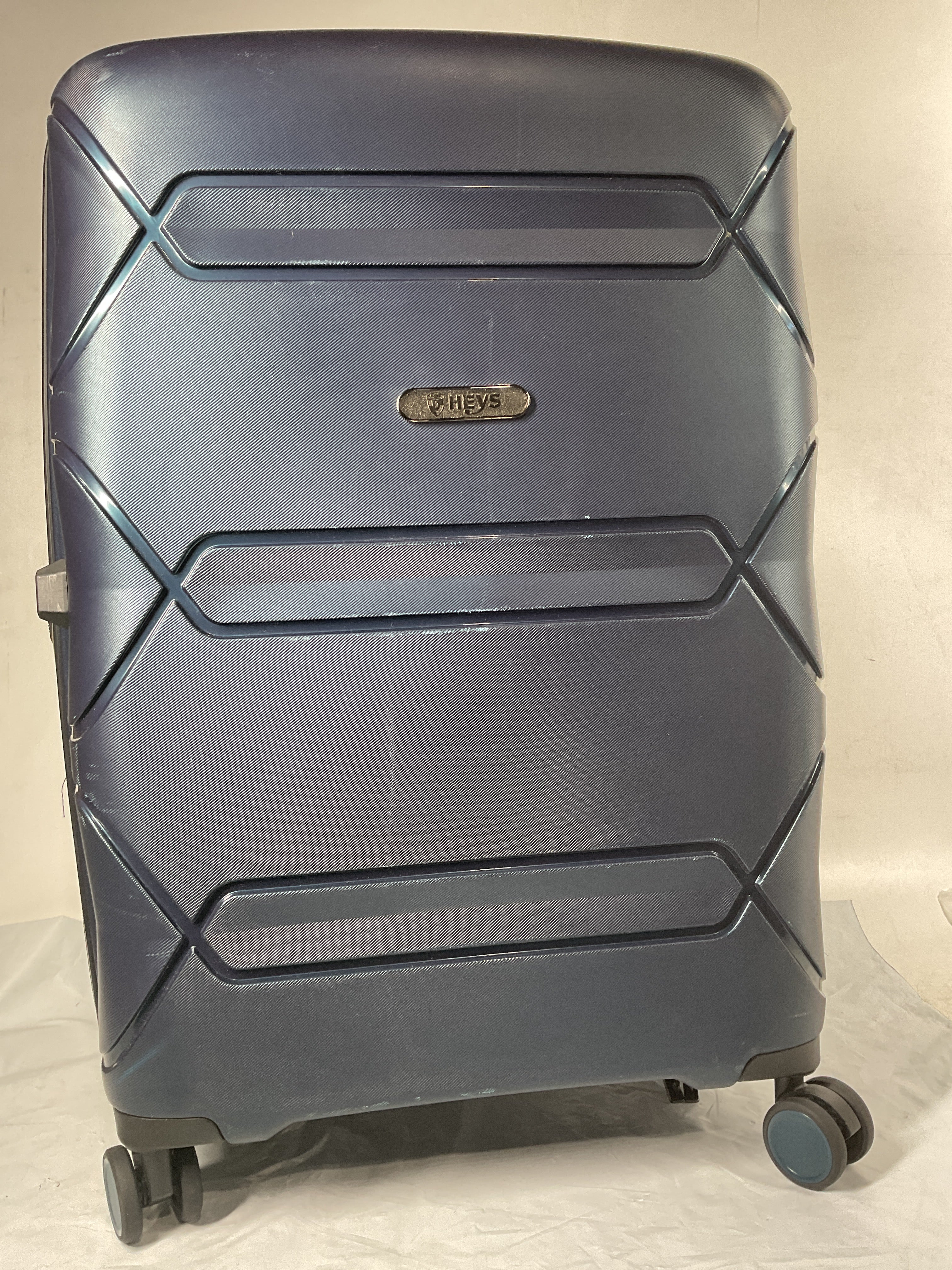 Heys Milos Durable and lightweight luggage, made with Duraflex impact-resistant material, TSA Combination Lock, Dual Spinner Wheels, and Expandable ( Navy , 26-Inch Checked-Medium ) Navy 26 Inch Checked Medium U2