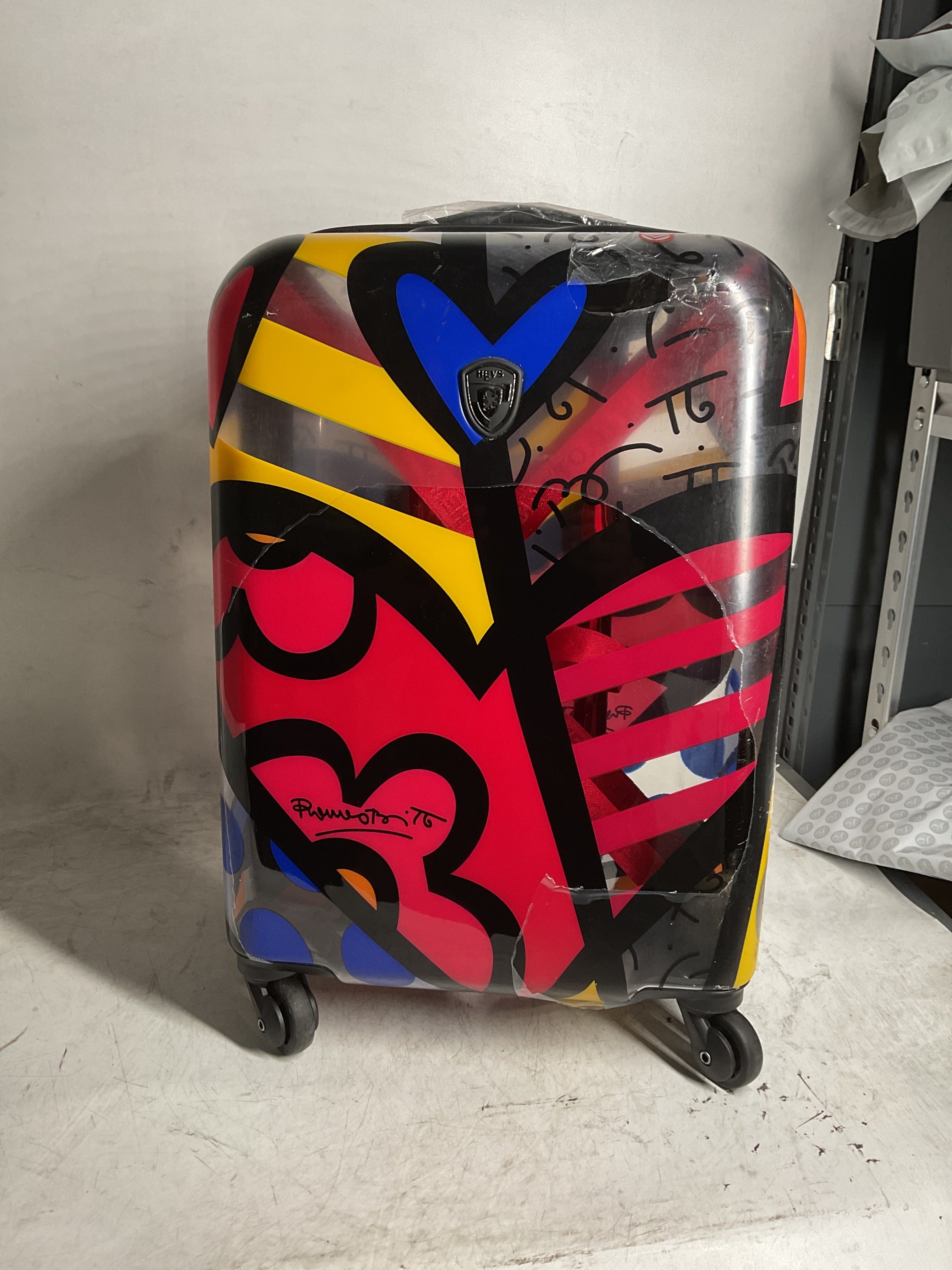 Heys Britto Transparent 21" Carry On Spinner Luggage ( Transparent New Day ) Transparent New Day  U2