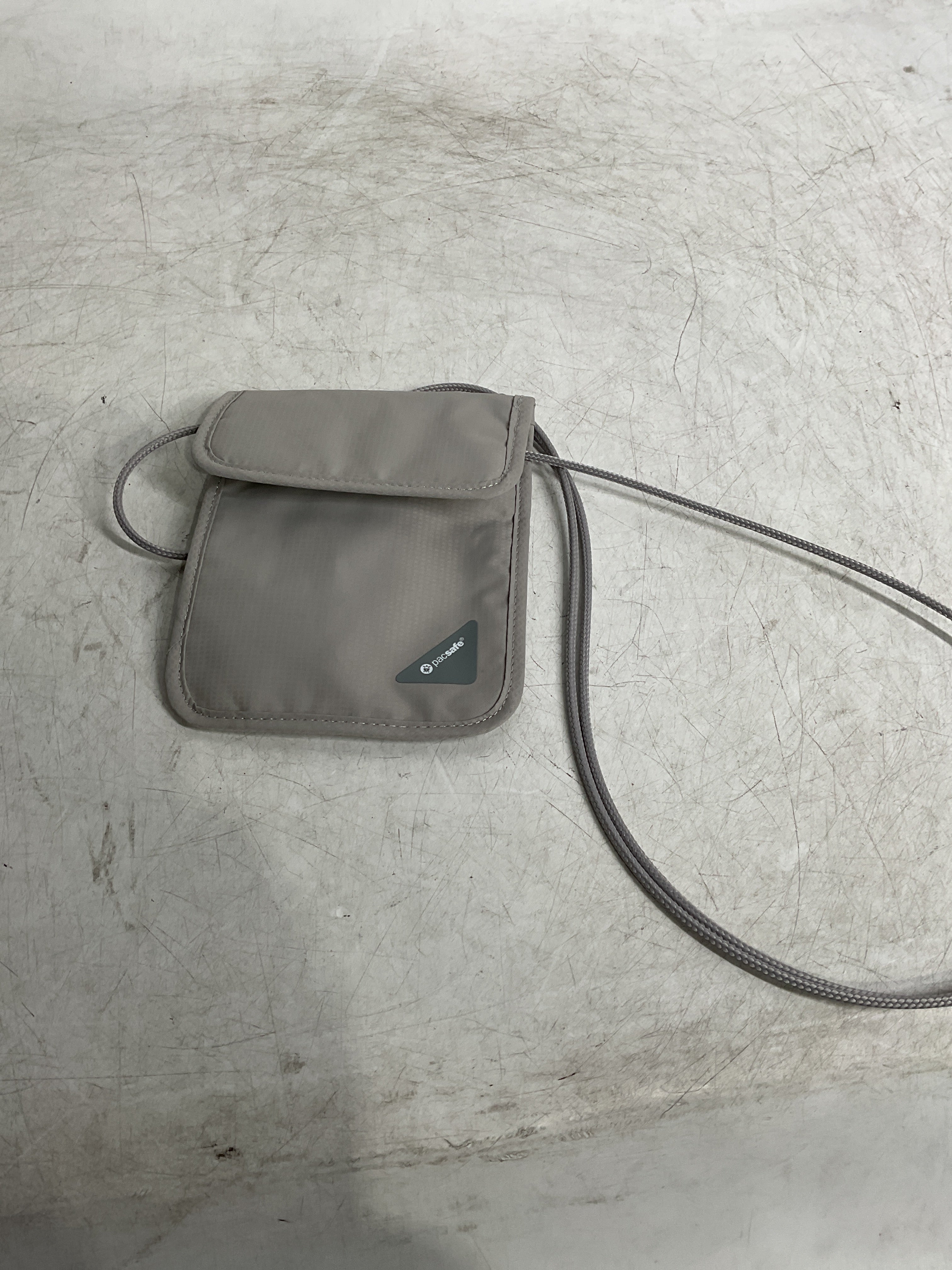 Pacsafe Coversafe X75 Anti-theft RFID Blocking Neck Pouch ( Neutral Grey , One Size ) Neutral Grey One Size U2