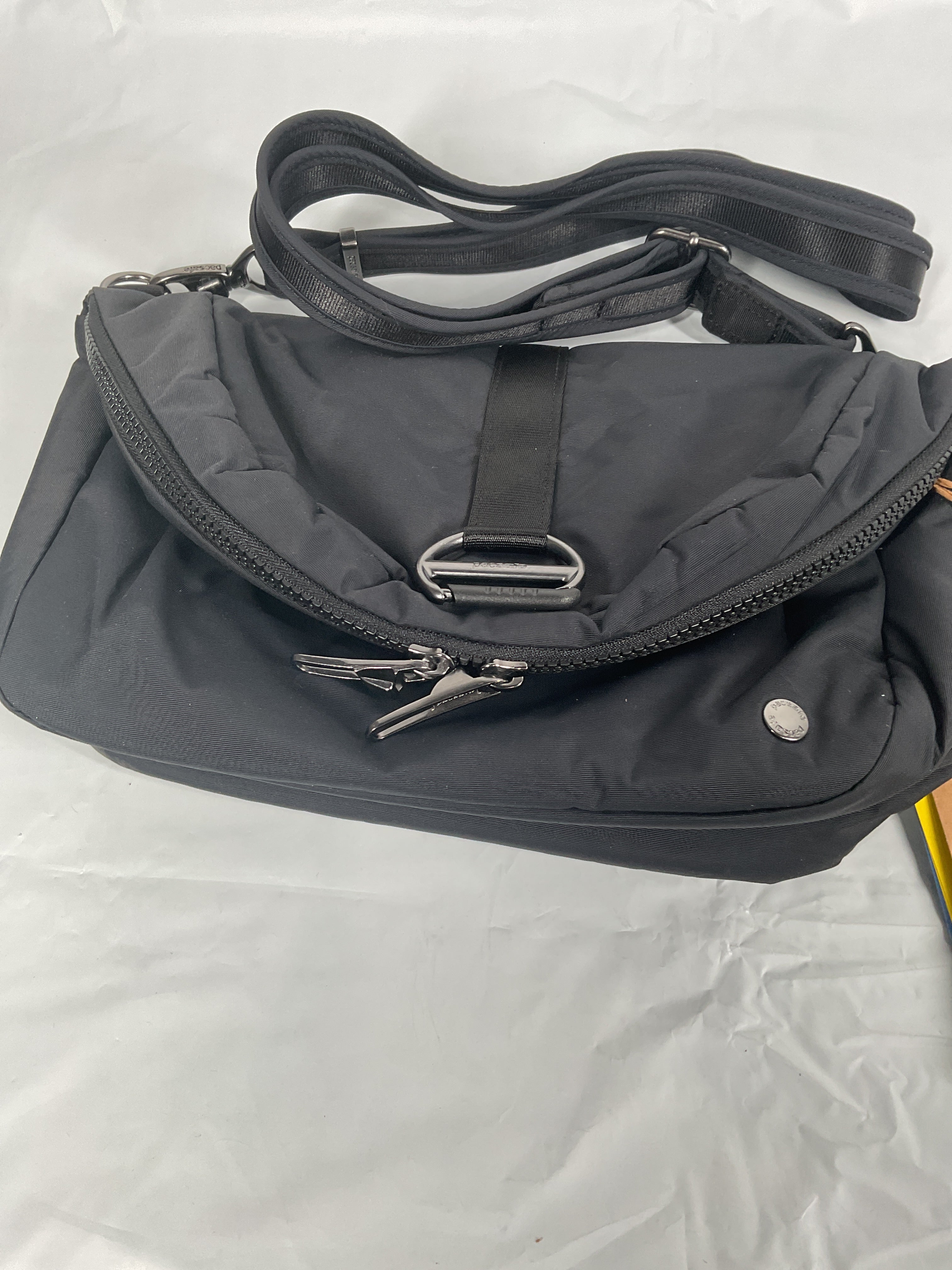 Pacsafe CX Convertible Backpack ( Econyl Black , 8 Liter ) Econyl Black 8 Liter U3