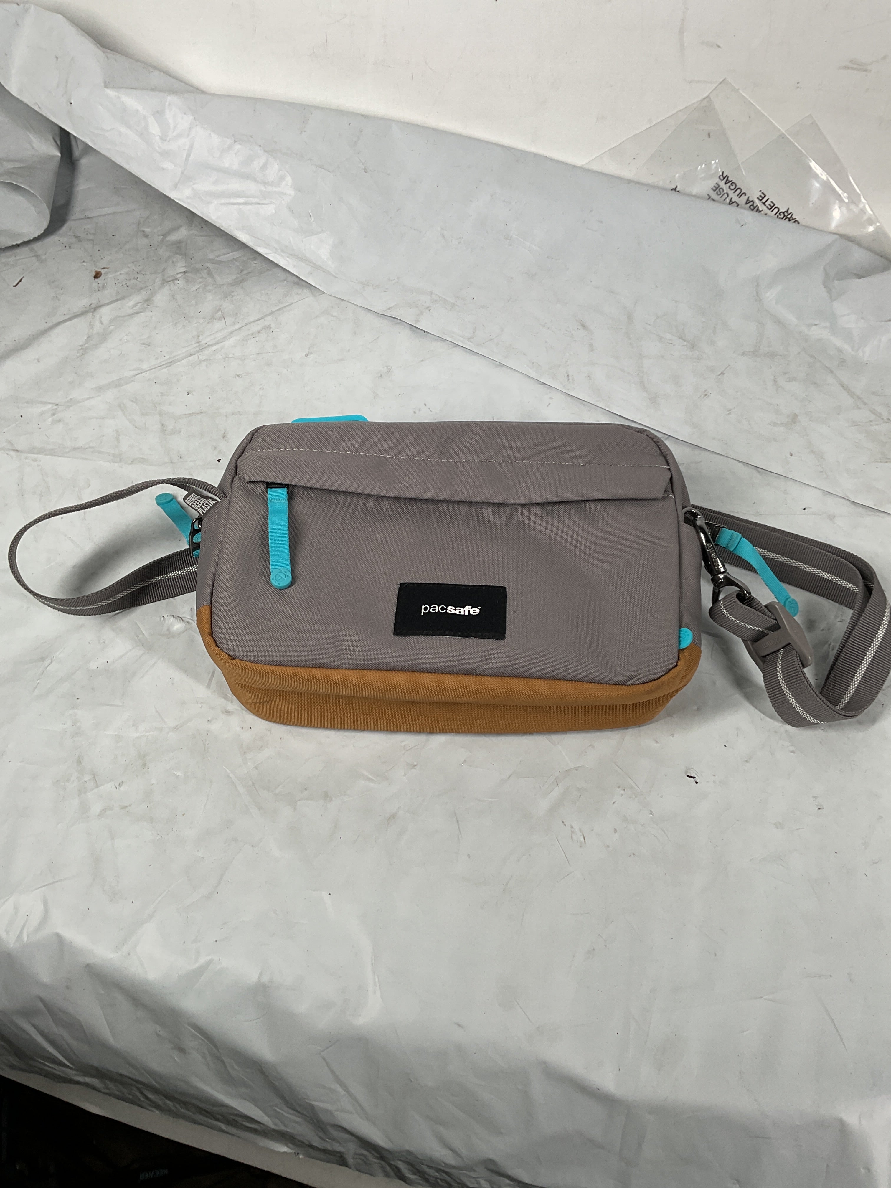 Pacsafe GO Crossbody ( Stone , 2.5 Litre ) Stone 2 5 Litre U1