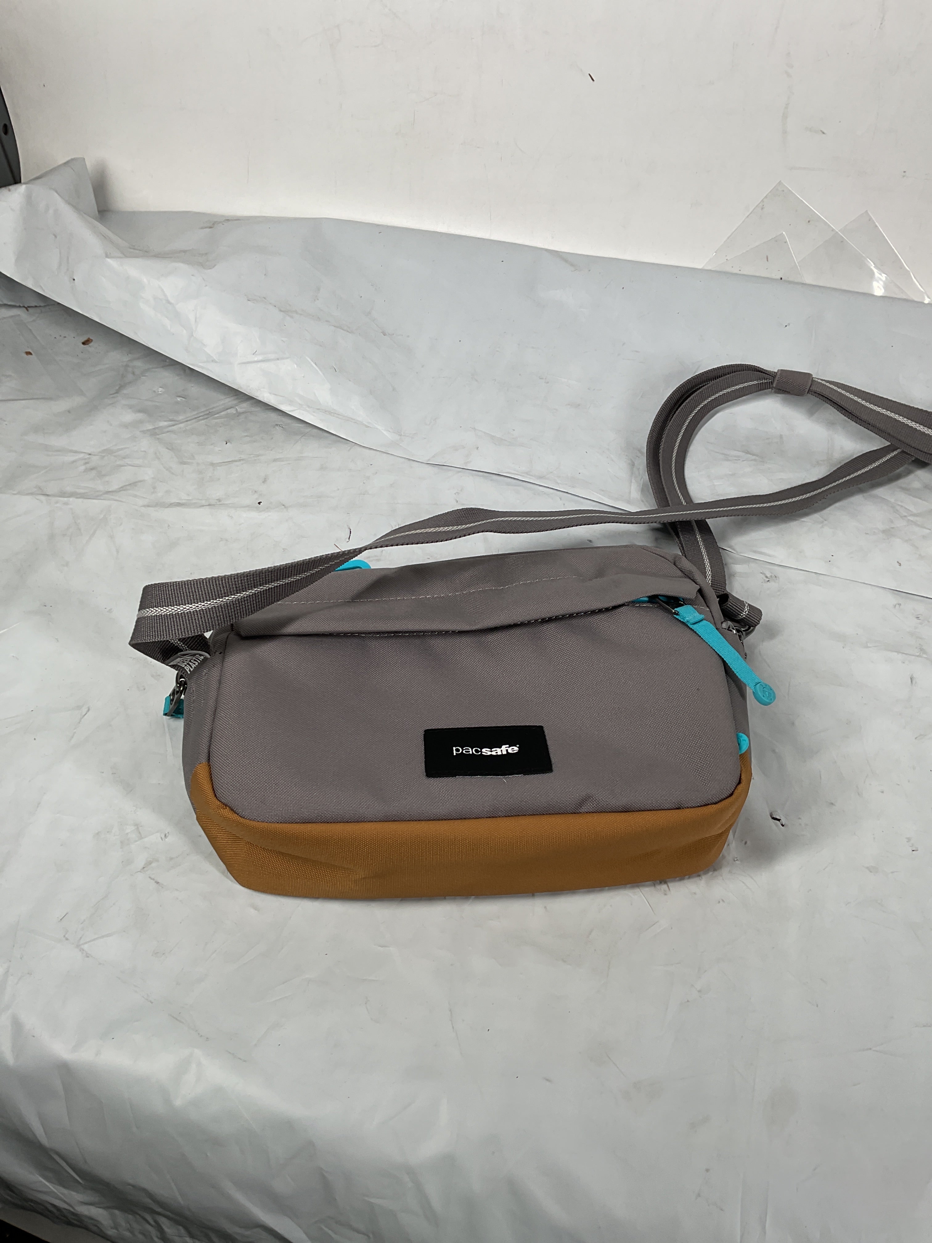 Pacsafe GO Crossbody ( Stone , 2.5 Litre ) Stone 2 5 Litre U2