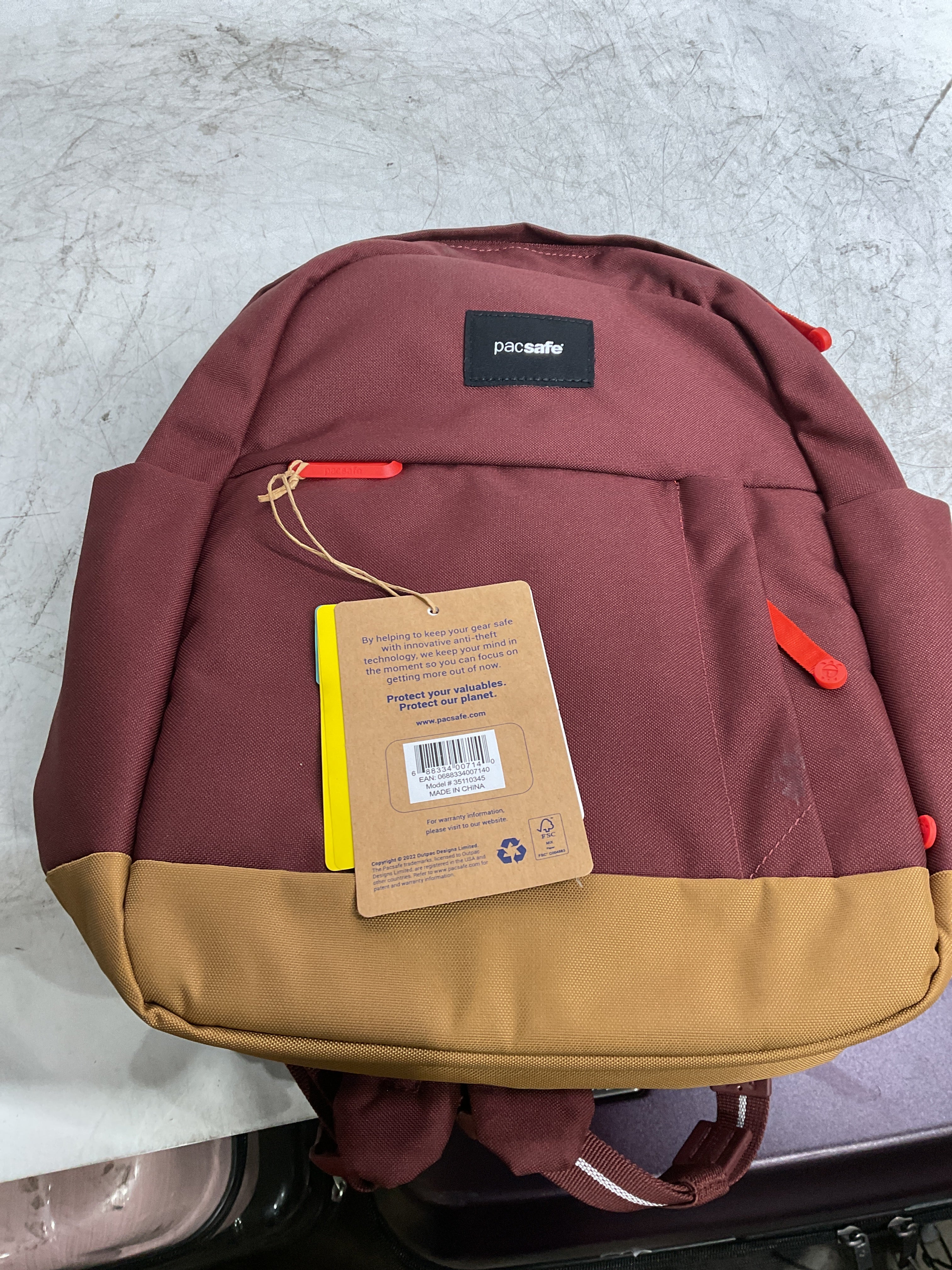 Pacsafe GO 15L Backpack ( Garnet Red , 15 Litre ) Garnet Red 15 Litre U1