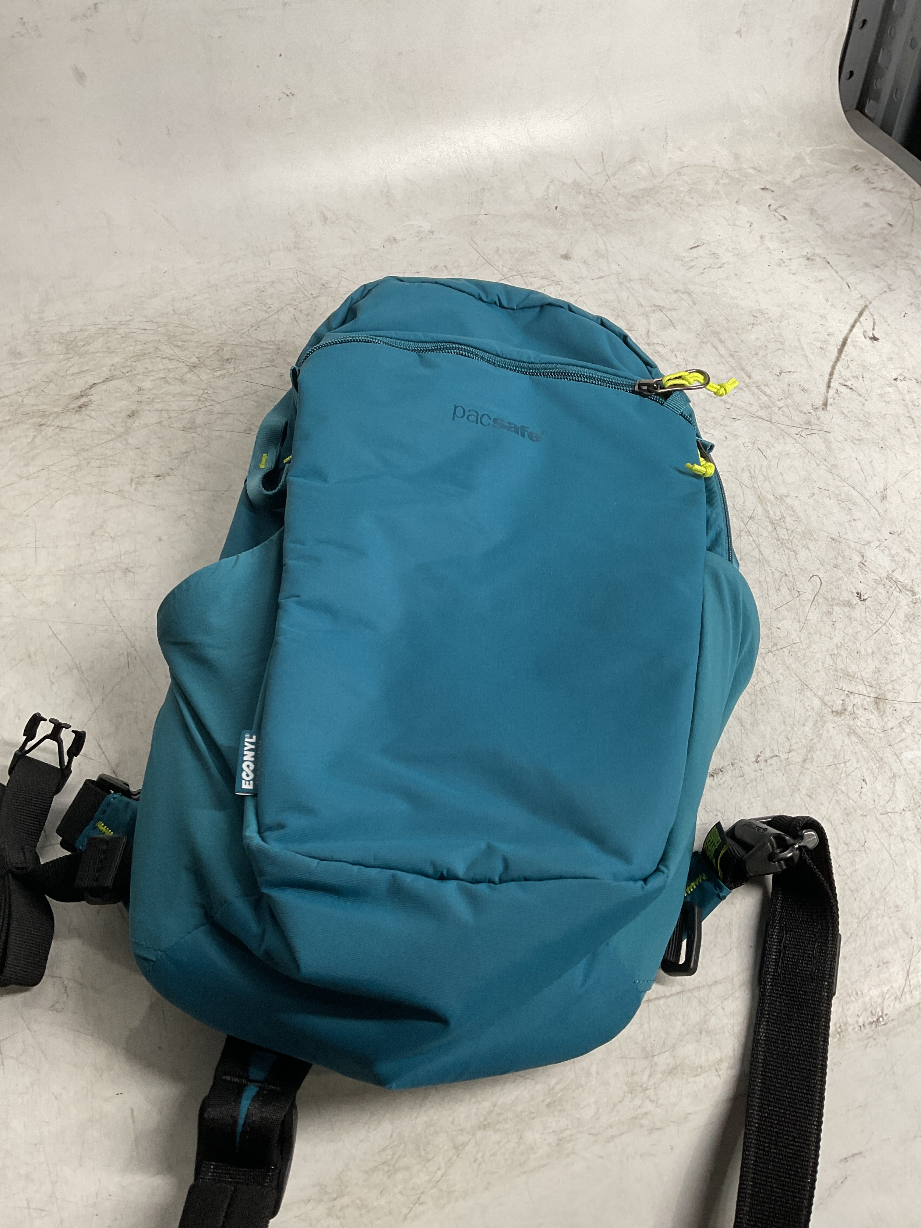 Pacsafe ECO 12L Anti Theft Sling Backpack ( Blue , One Size ) Blue One Size U1