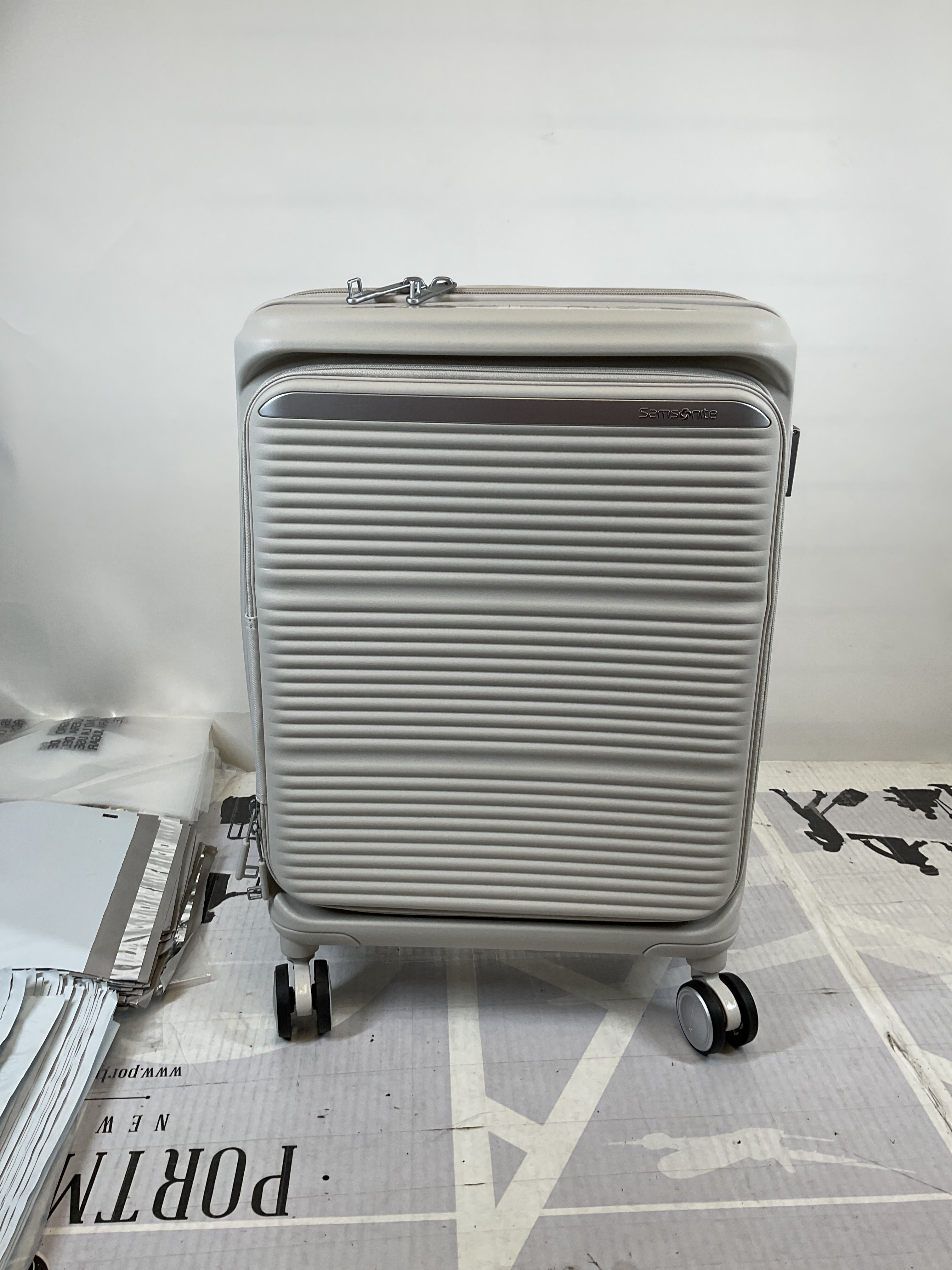 Samsonite Paralux Carry-On Luggage - Innovative Design - Quick Access Front Pocket - Dual Suspension Wheel Technology - TSA Lock - Expandable - Includes Removable Packing Cubes ( Stone Grey , Carry-On Spinner ) Stone Grey Carry On Spinner U3