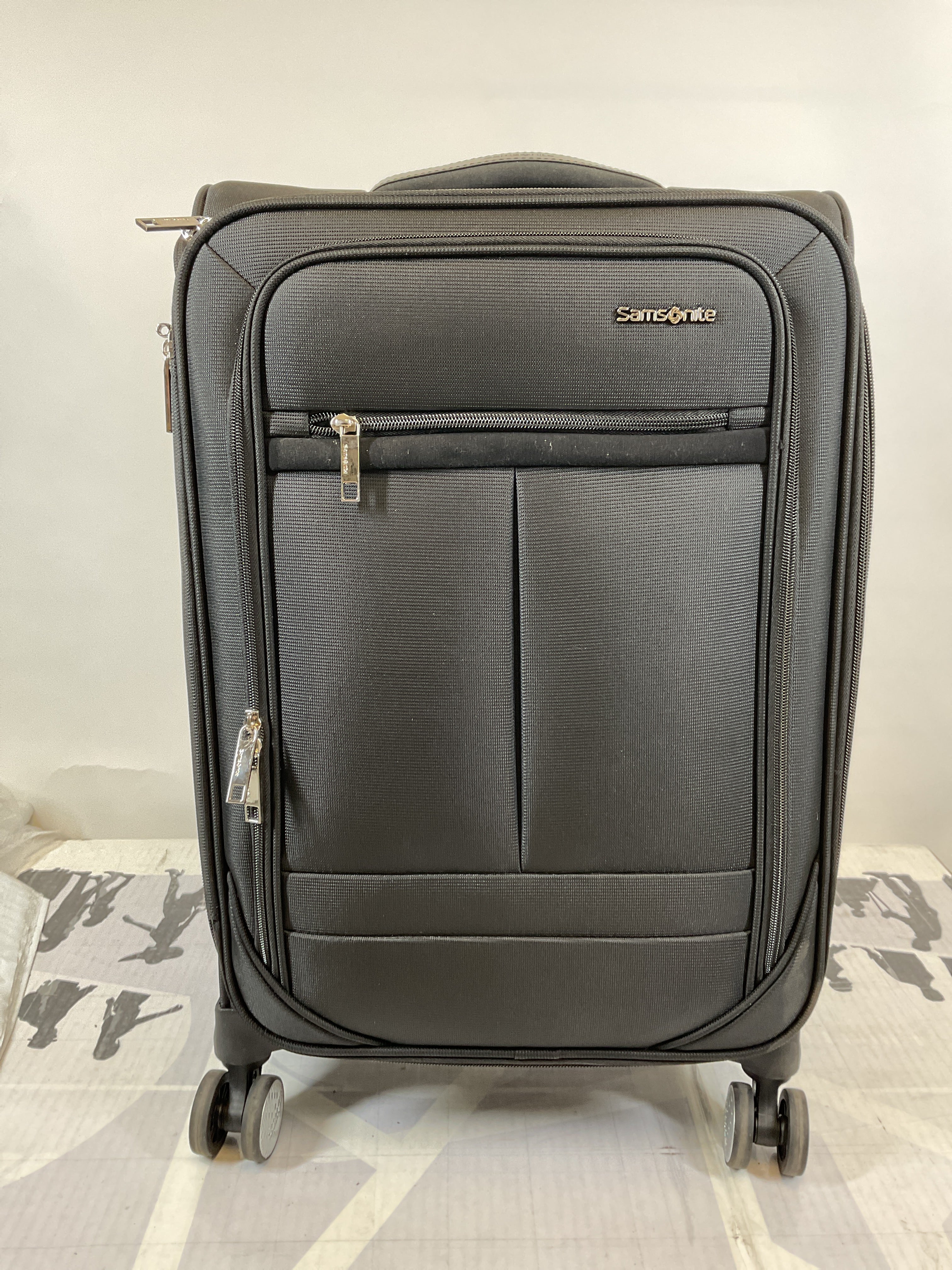 Samsonite Element Carry-On Soft-Sided Expandable 21-Inch Suitcase: Airline Approved for Most Major Airlines, Durable, 360 Spinner Wheels, Adjustable Handle, 2 Front & Side Pocket ( Black , 21-Inch Carry-On ) Black 21 Inch Carry On U22