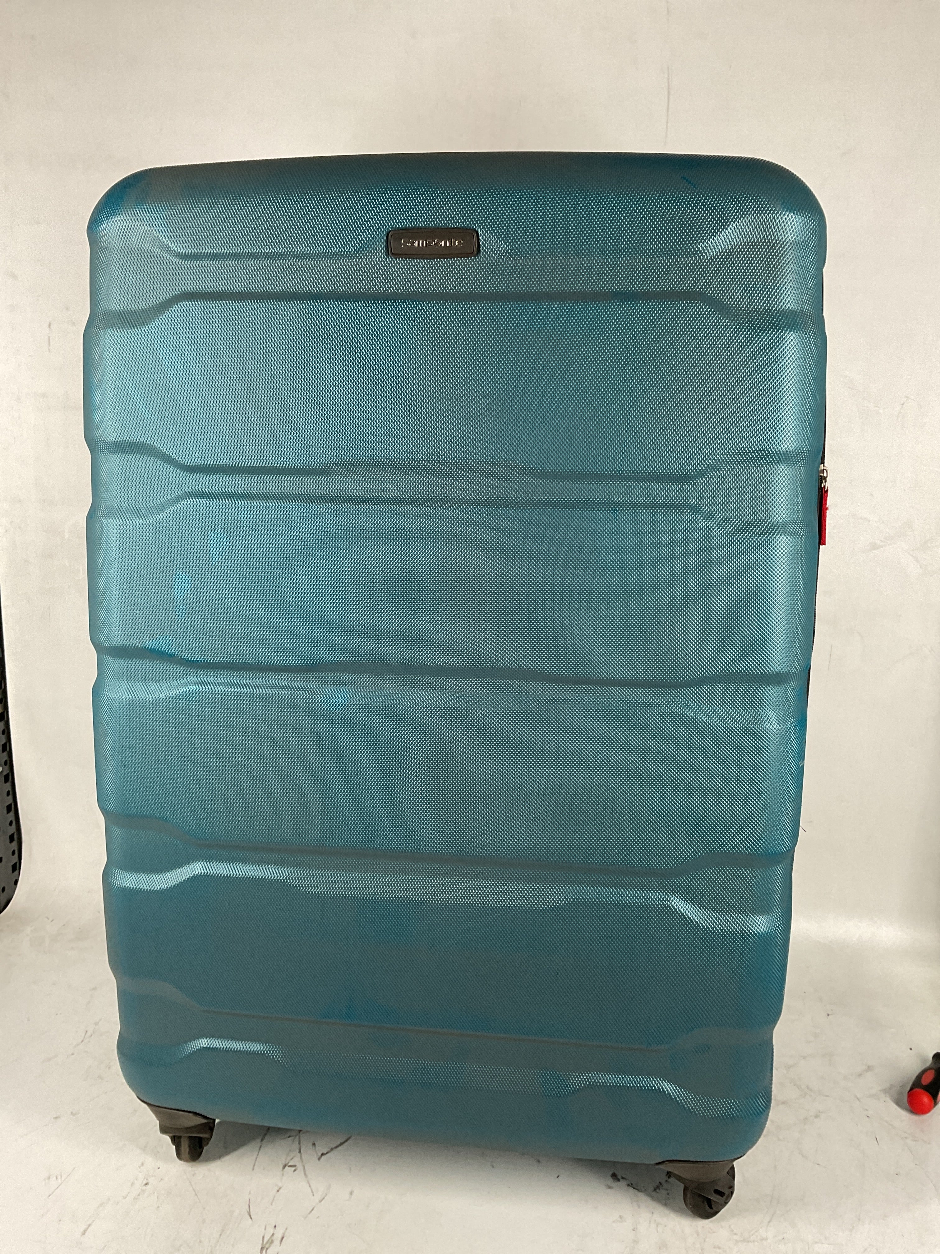 Samsonite Omni Pc Hardside Expandable Luggage with Spinner Wheels Caribbean Blue Checked Large 28 Inch U23