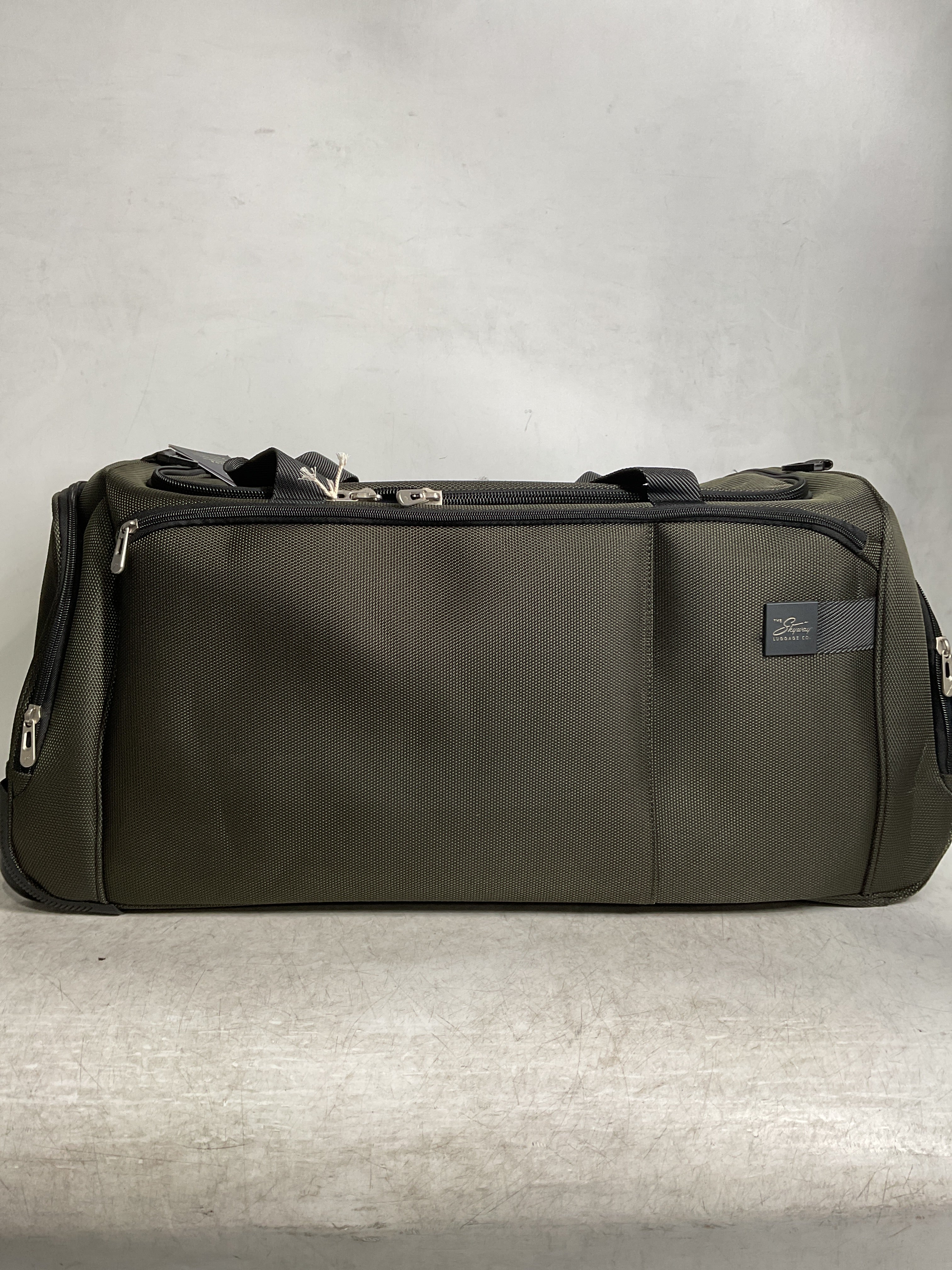 Skyway Luggage Sigma 7.0 Softside Rolling Duffel Bag  Extra Large Wheeled Travel Duffle with Telescoping Handle & Side Pockets, Ideal for Long Trips, Men and Women ( Pine , 28" Rolling Duffel Bag ) Pine 28 Rolling Duffel Bag U1