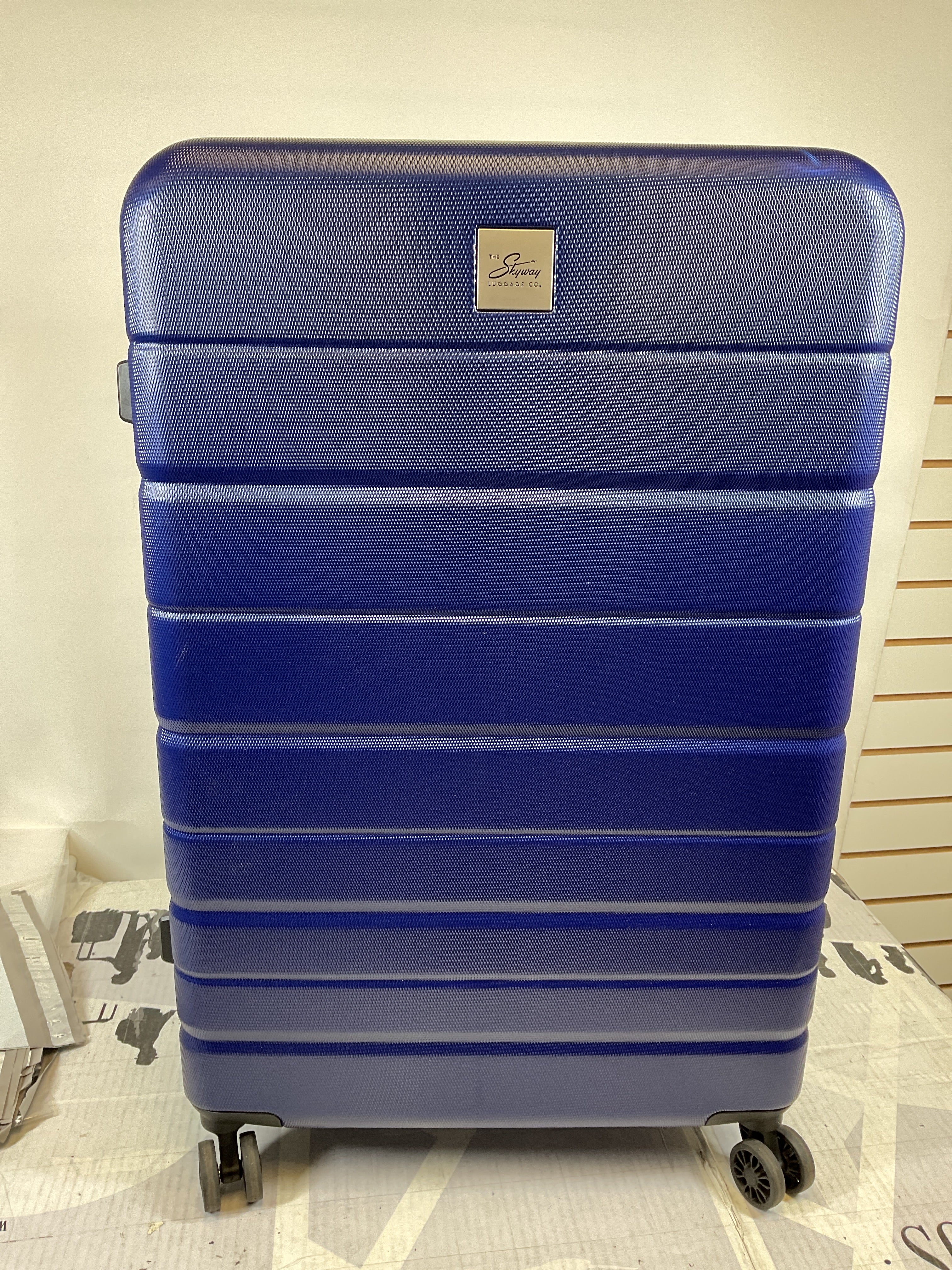 Skyway Epic 2.0 Hardside Lightweight and Durable ABS Shell Luggage, Spacious with Dual Spinning Wheels, Comfort Grip and Expandable, Men and Women ( Royal Blue , Checked-Large 28-inch ) Royal Blue Checked Large 28 Inch U1