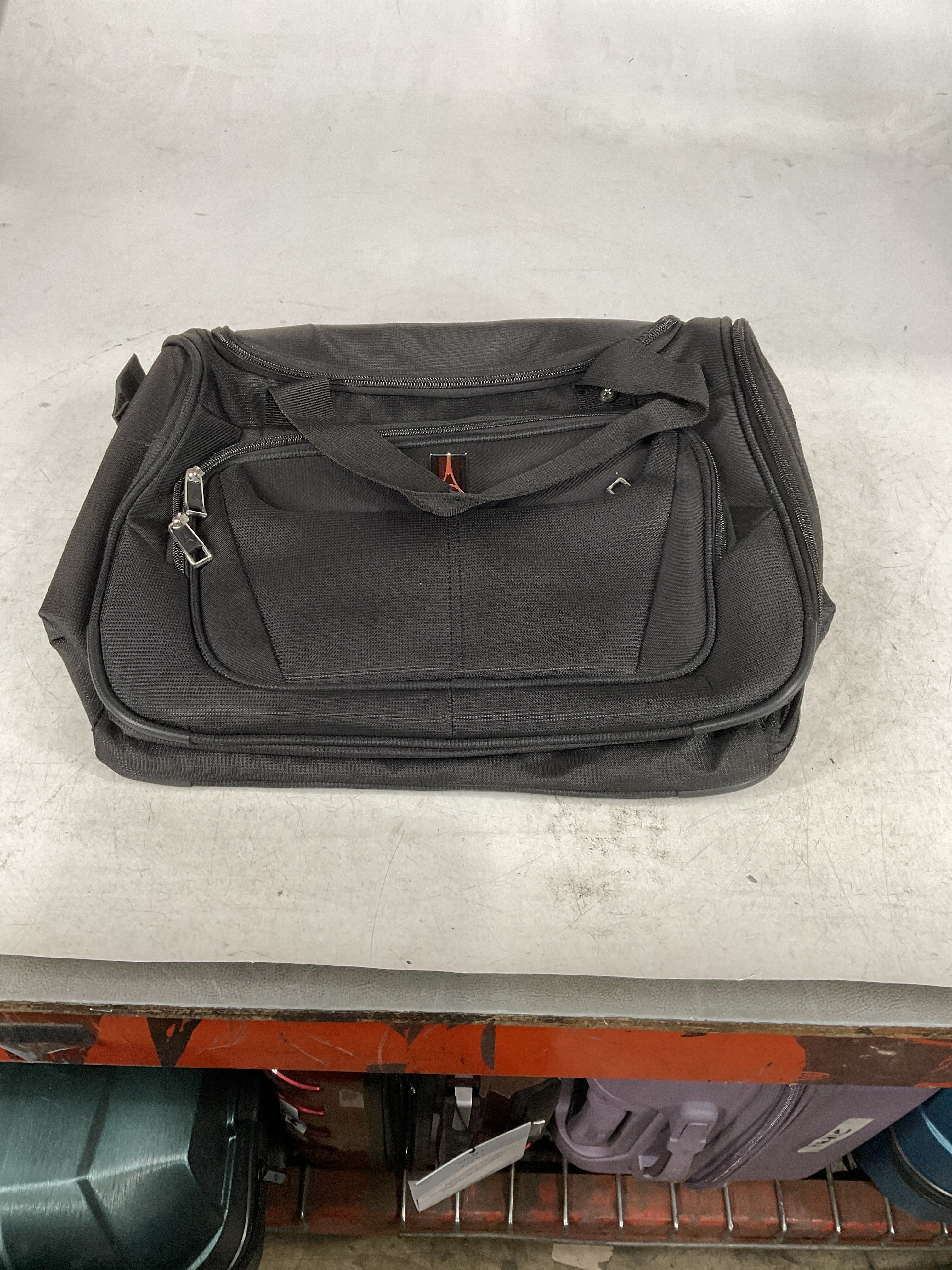 Travelpro Maxlite 5 Softside Lightweight Underseat Carry-On Travel Tote, Overnight Weekender Bag, Men and Women Black 18 Inch U12