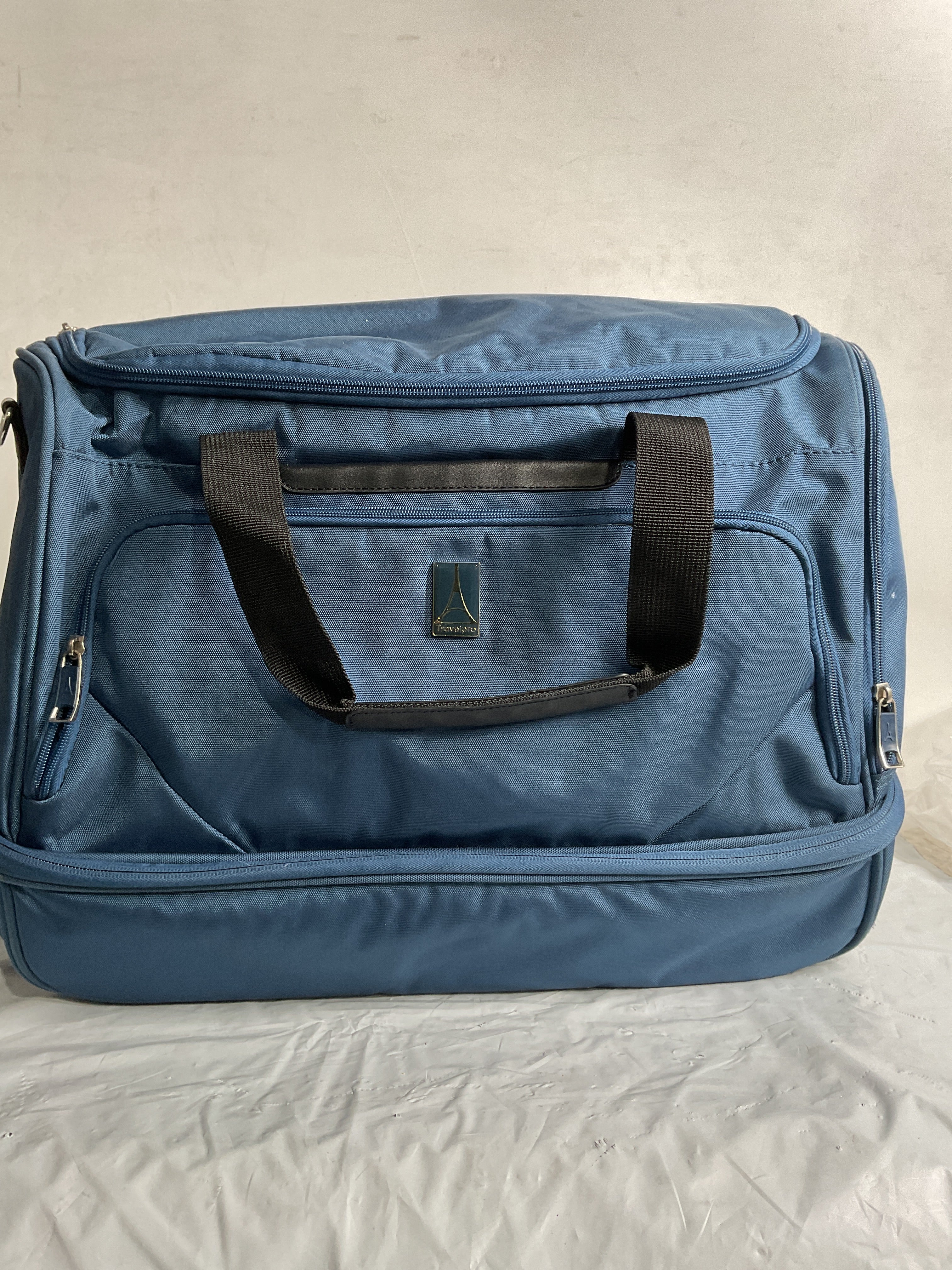 Travelpro Maxlite 5 Carry on Weekender with Drop-Bottom Compartment, Lightweight Overnight Travel Duffel Bag ( Ensign Blue , 19-Inch ) Ensign Blue 19 Inch U3