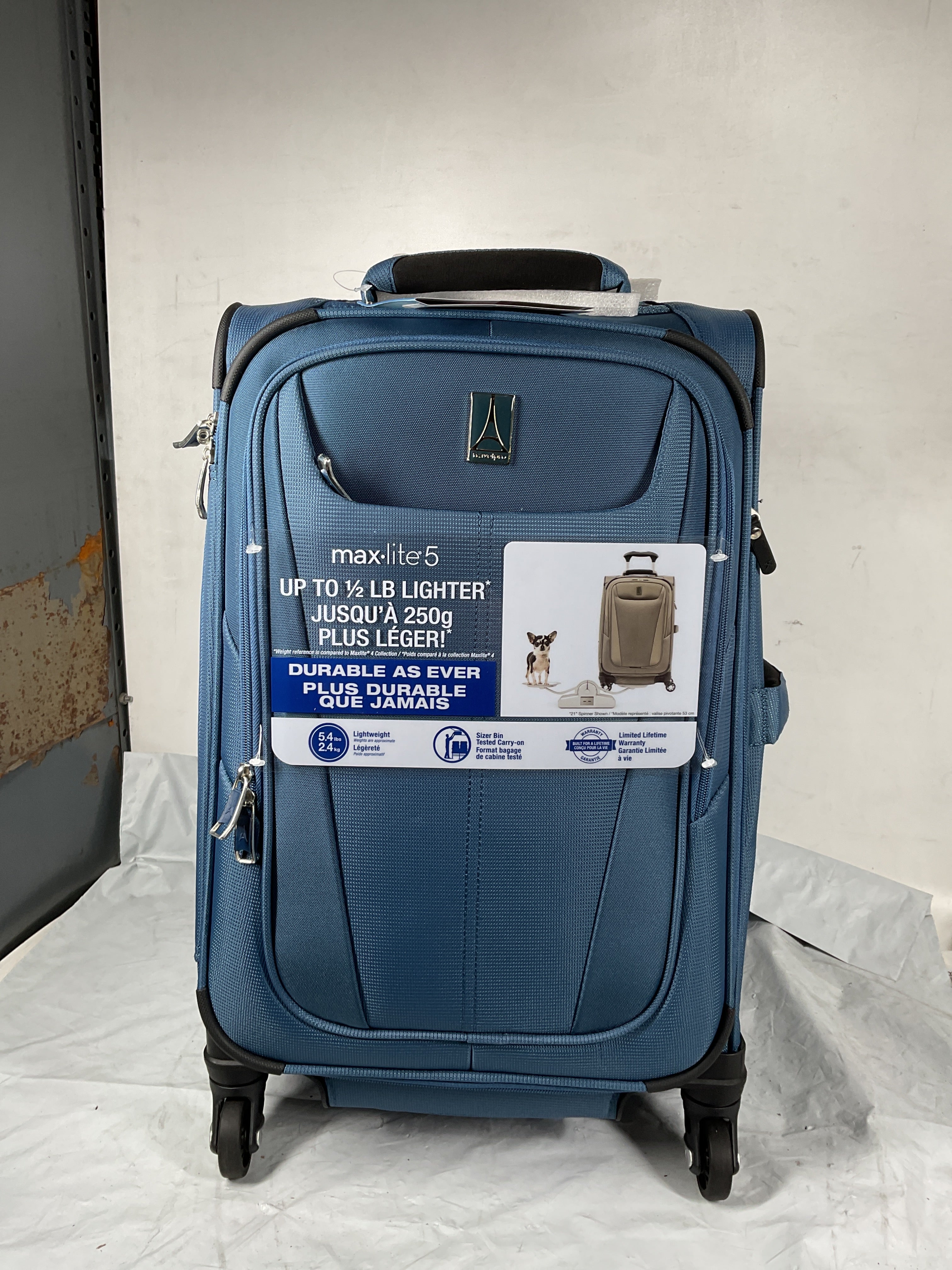 Travelpro Maxlite 5 Softside Expandable Luggage with 4 Spinner Wheels, Lightweight Suitcase, Men and Women ( Ensign Blue , Carry-on 21-Inch ) Ensign Blue Carry On 21 Inch U93