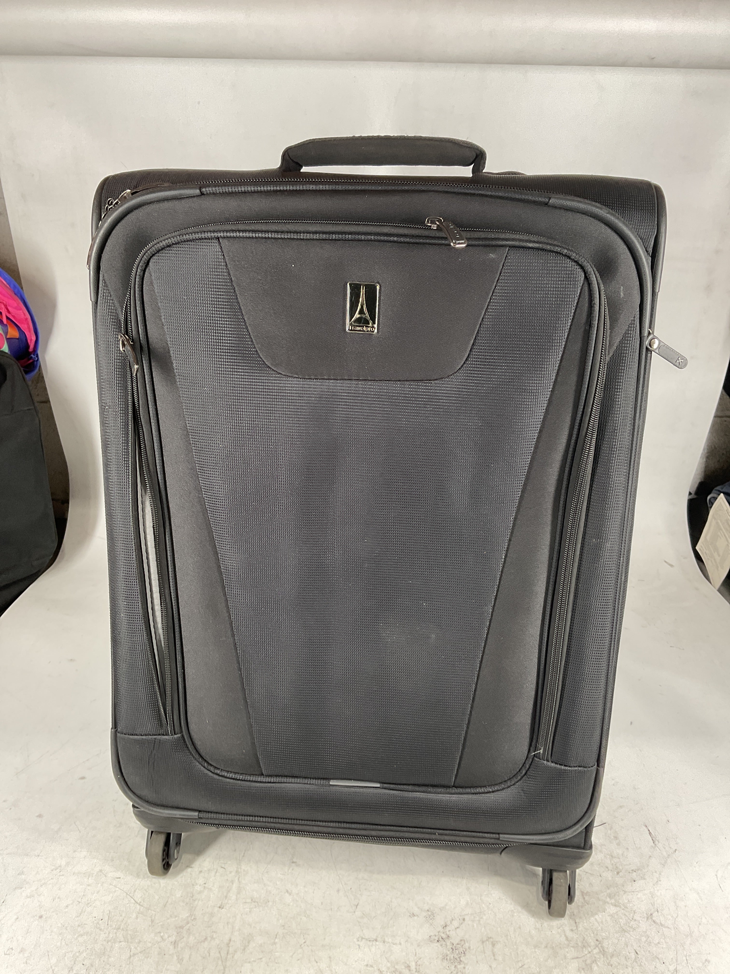 Travelpro Maxlite 5 Softside Expandable Luggage with 4 Spinner Wheels, Lightweight Suitcase, Men and Women Black Checked Medium 25 Inch U21