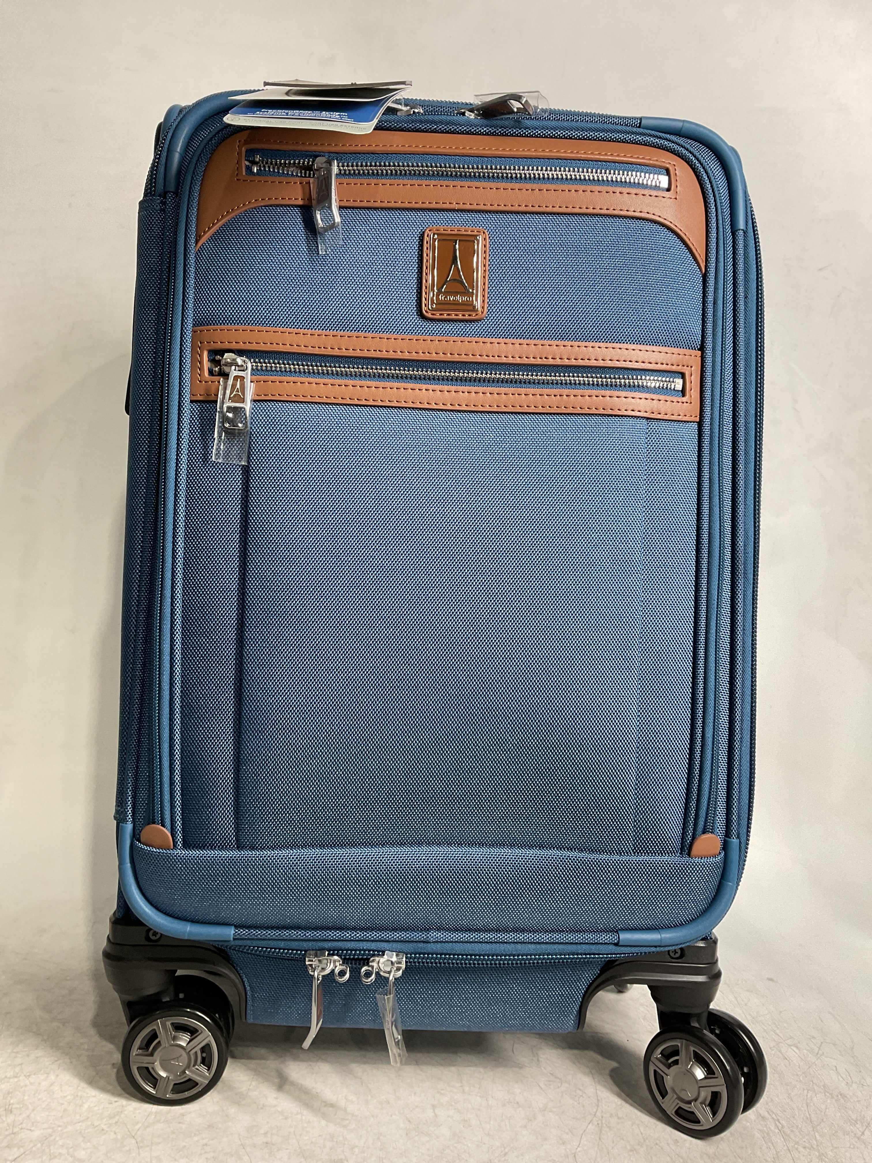 Travelpro Platinum Elite Softside Expandable Checked Luggage, 8 Wheel Spinner Large Suitcase, TSA Lock, Men and Women ( Coastal Blue , Carry-On 21-Inch ) Coastal Blue Carry On 21 Inch U1