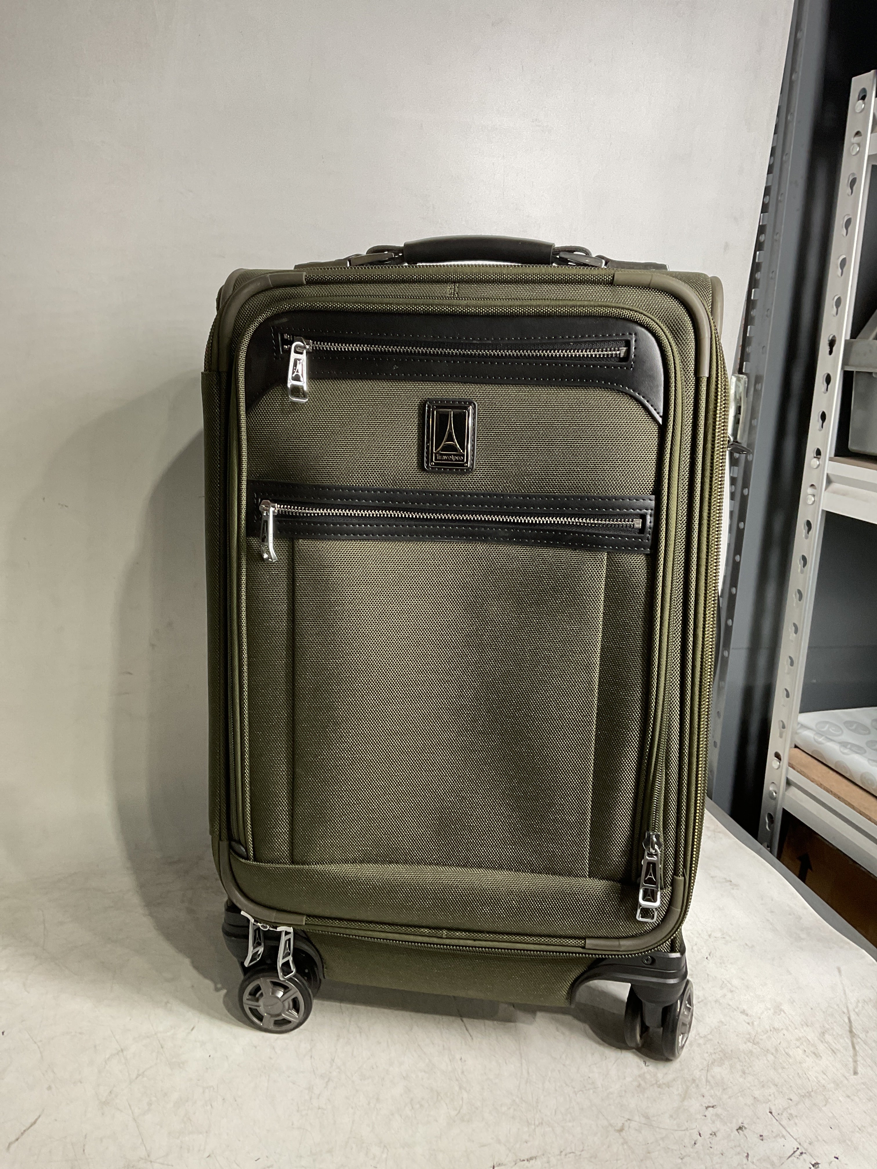 Travelpro Platinum Elite Softside Expandable Checked Luggage, 8 Wheel Spinner Large Suitcase, TSA Lock, Men and Women ( Pilot Green , Carry-On 21-Inch ) Pilot Green Carry On 21 Inch U3