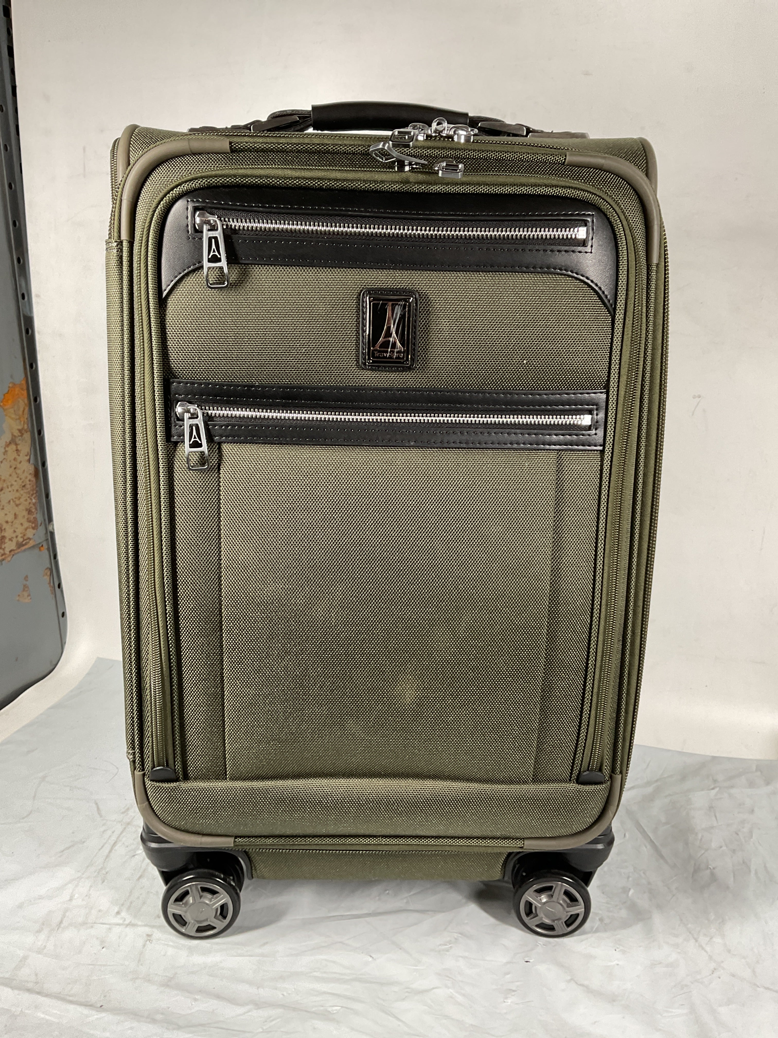 Travelpro Platinum Elite Softside Expandable Checked Luggage, 8 Wheel Spinner Large Suitcase, TSA Lock, Men and Women ( Pilot Green , Carry-On 21-Inch ) Pilot Green Carry On 21 Inch U6