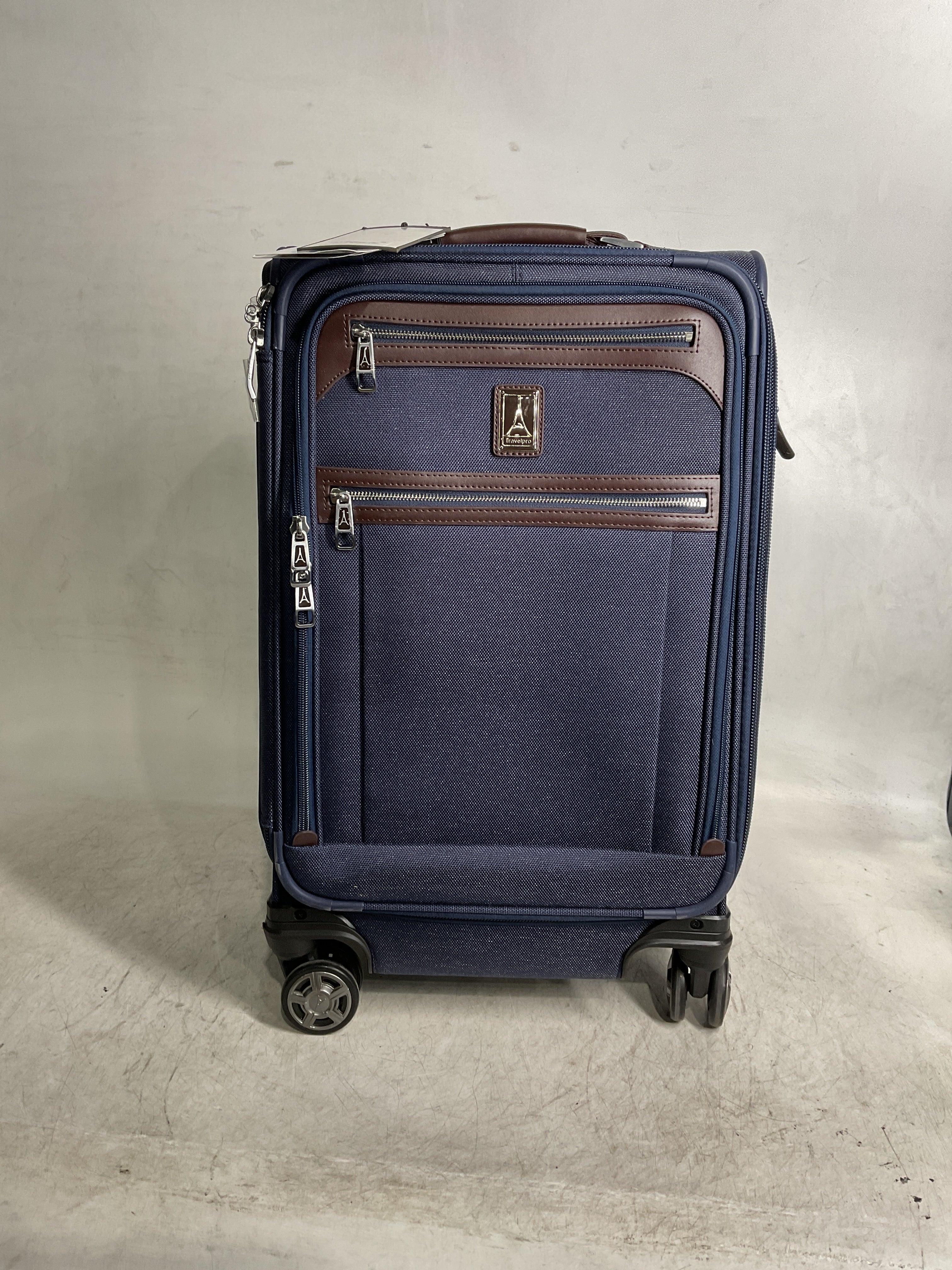 Travelpro Platinum Elite Softside Expandable Checked Luggage, 8 Wheel Spinner Large Suitcase, TSA Lock, Men and Women ( True Navy Blue , Carry-On 21-Inch ) True Navy Blue Carry On 21 Inch U7