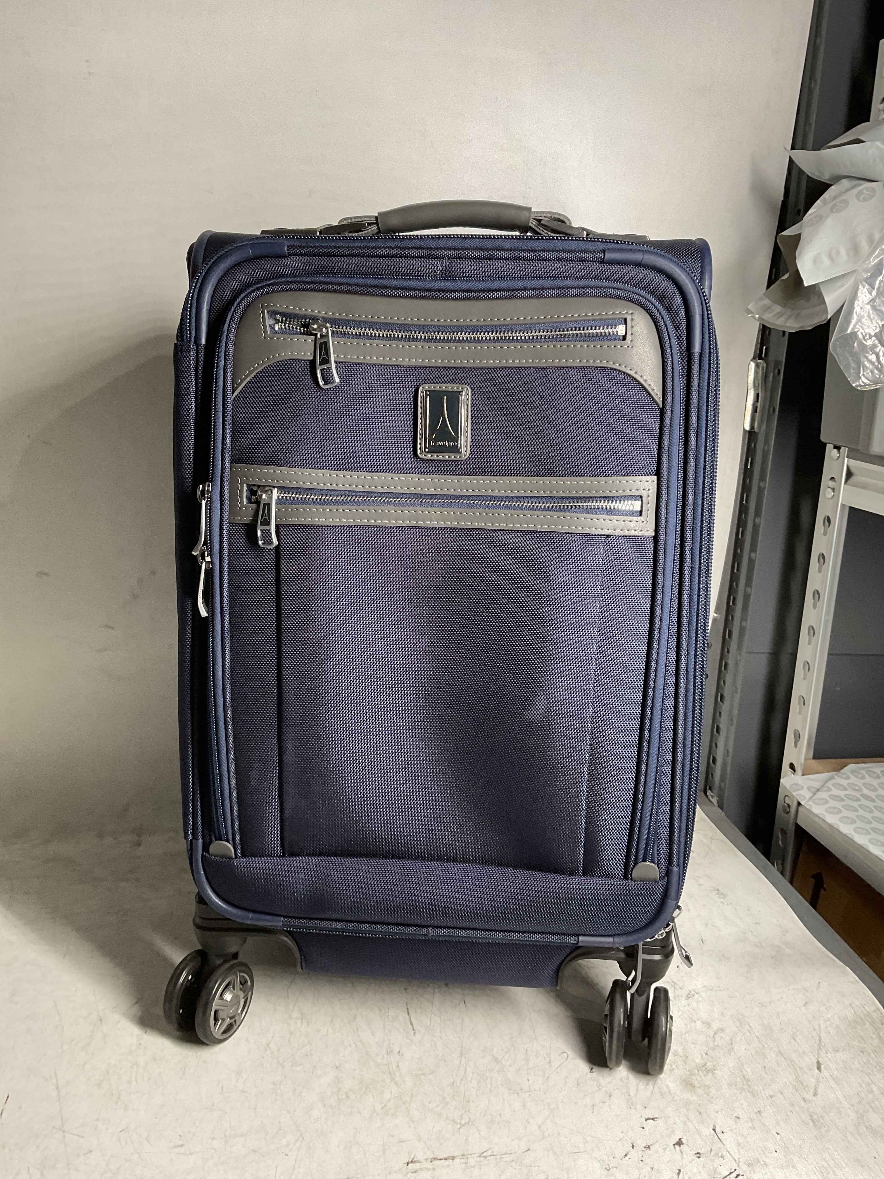 Travelpro Platinum Elite Softside Expandable Checked Luggage, 8 Wheel Spinner Large Suitcase, TSA Lock, Men and Women ( Dark Blue , Carry-On 21-Inch ) Dark Blue Carry On 21 Inch U1