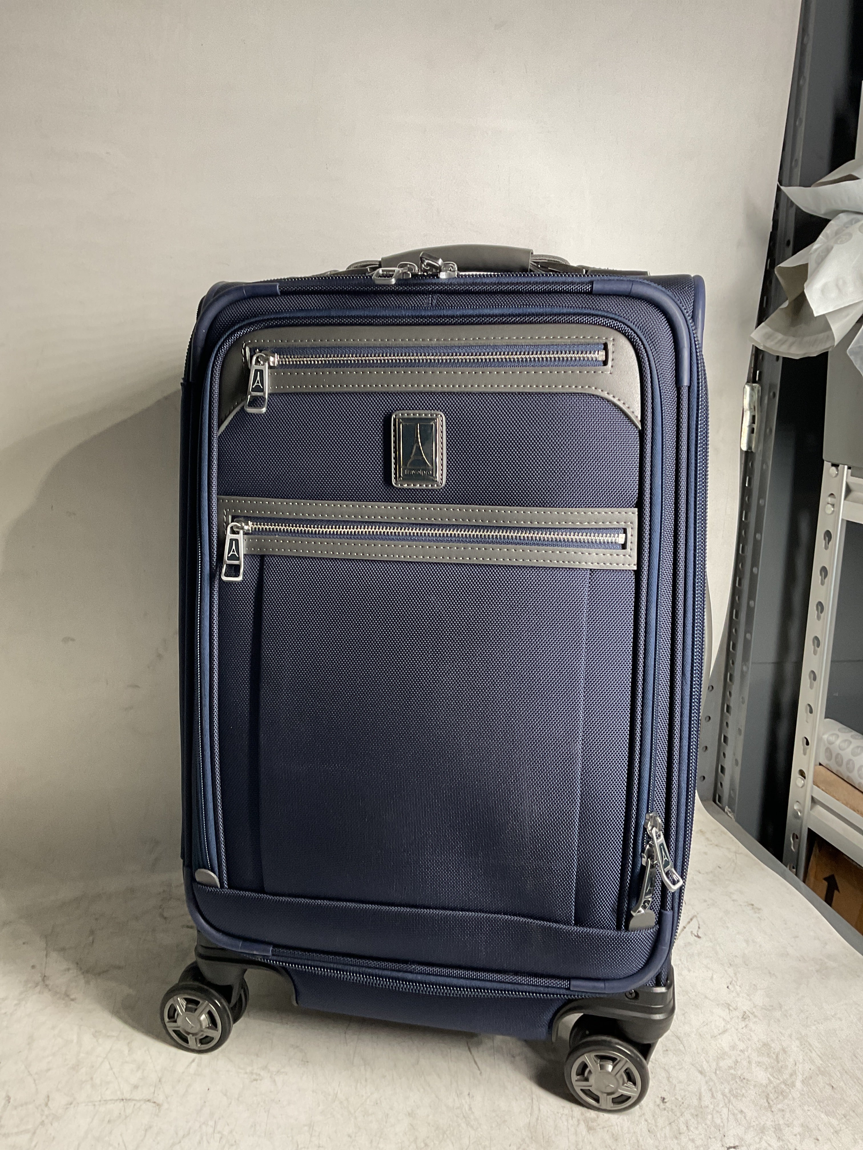 Travelpro Platinum Elite Softside Expandable Checked Luggage, 8 Wheel Spinner Large Suitcase, TSA Lock, Men and Women ( Dark Blue , Carry-On 21-Inch ) Dark Blue Carry On 21 Inch U2