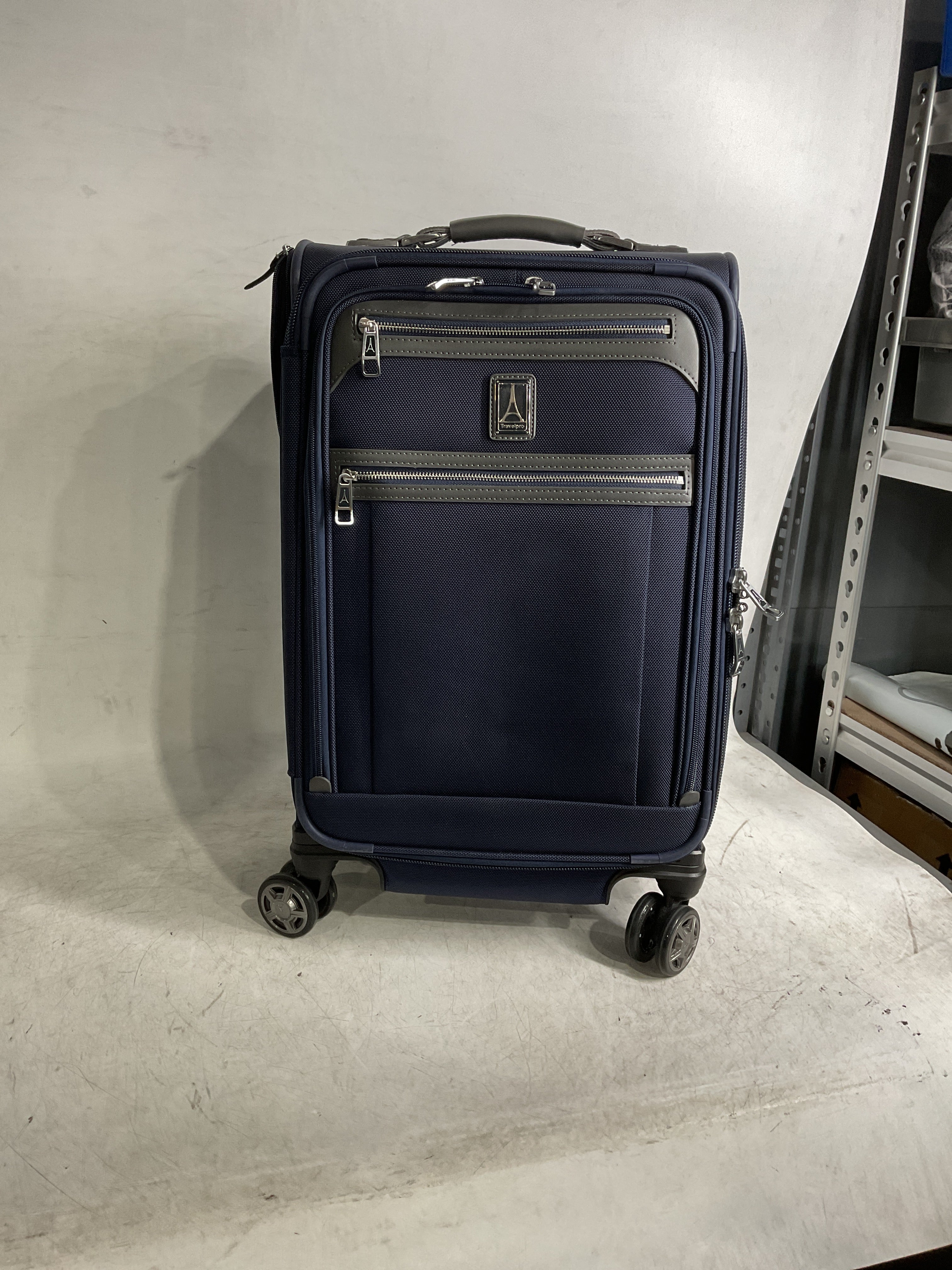 Travelpro Platinum Elite Softside Expandable Checked Luggage, 8 Wheel Spinner Large Suitcase, TSA Lock, Men and Women ( Dark Blue , Carry-On 21-Inch ) Dark Blue Carry On 21 Inch U6