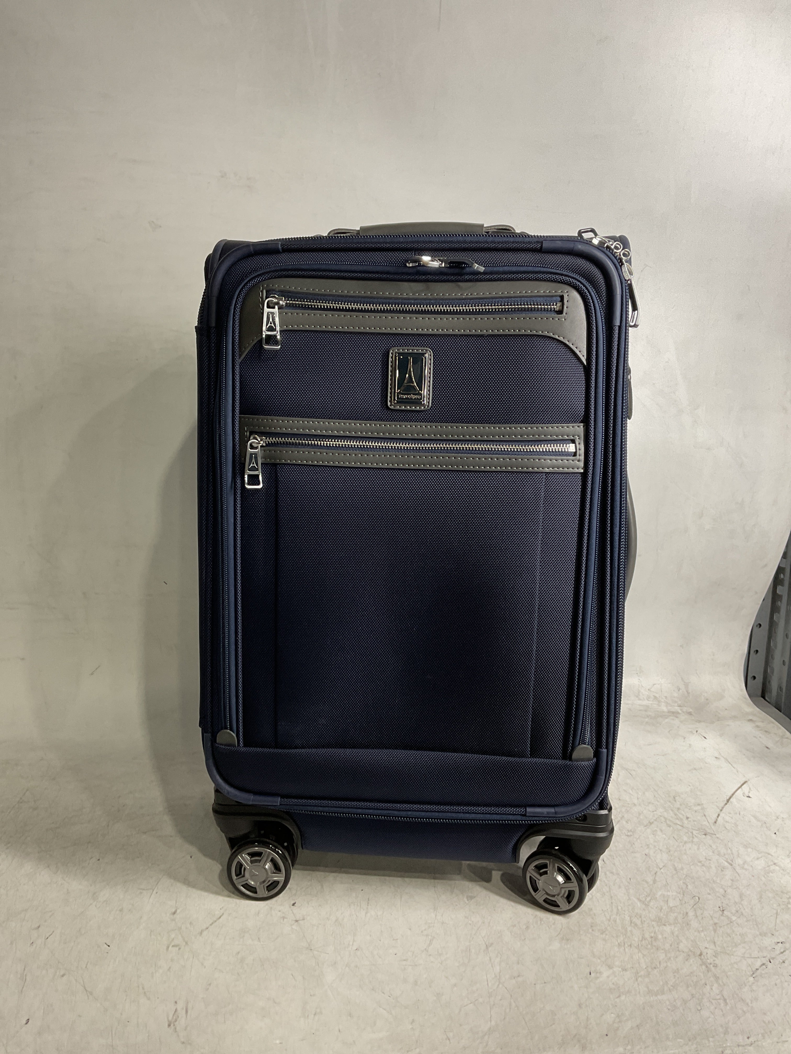 Travelpro Platinum Elite Softside Expandable Checked Luggage, 8 Wheel Spinner Large Suitcase, TSA Lock, Men and Women ( Dark Blue , Carry-On 21-Inch ) Dark Blue Carry On 21 Inch U7
