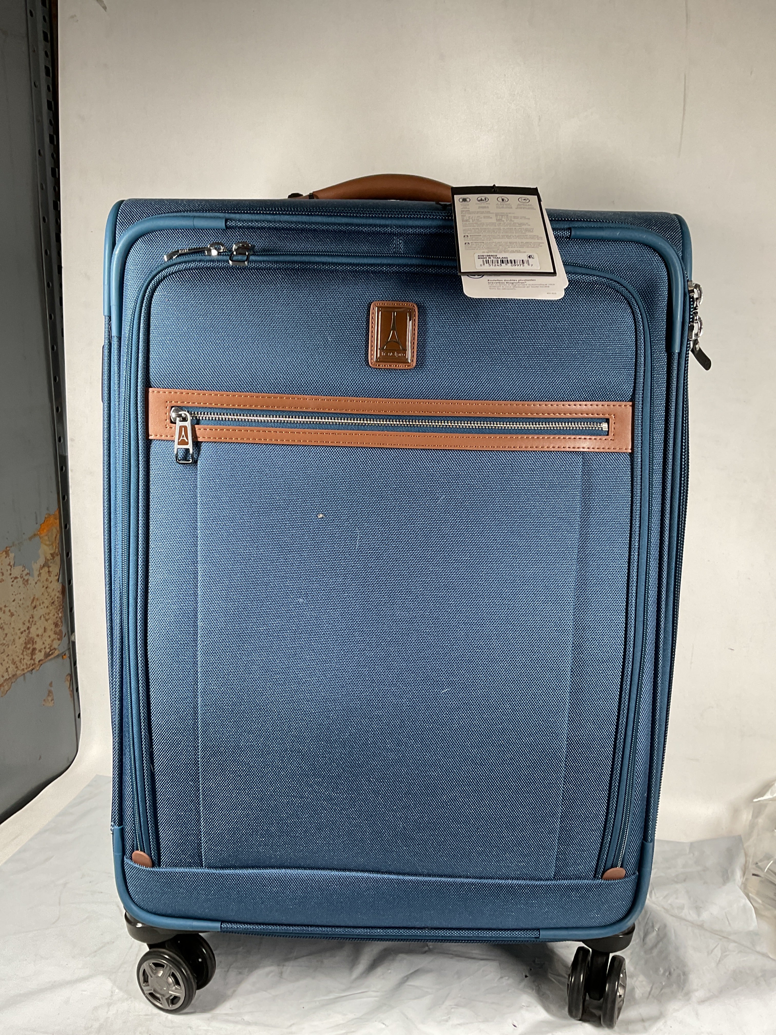 Travelpro Platinum Elite Softside Expandable Checked Luggage, 8 Wheel Spinner Large Suitcase, TSA Lock, Men and Women ( Coastal Blue , Checked-Medium 25-Inch ) Coastal Blue Checked Medium 25 Inch U2