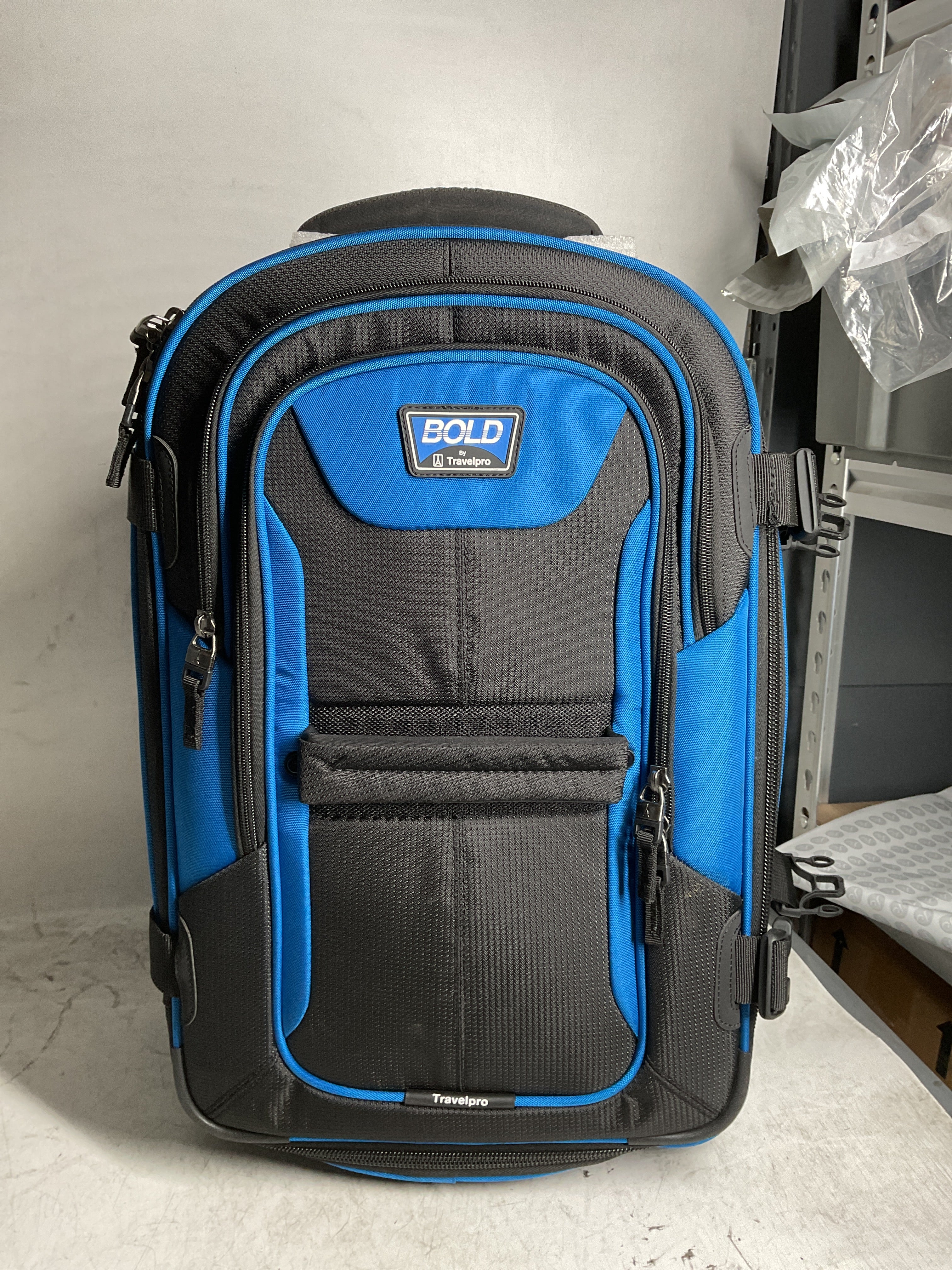 Travelpro Unisex-Adult Bold Softside Expandable Rollaboard Upright Luggage ( Blue/Black , Carry-On 22-Inch ) Blue/Black Carry On 22 Inch U7