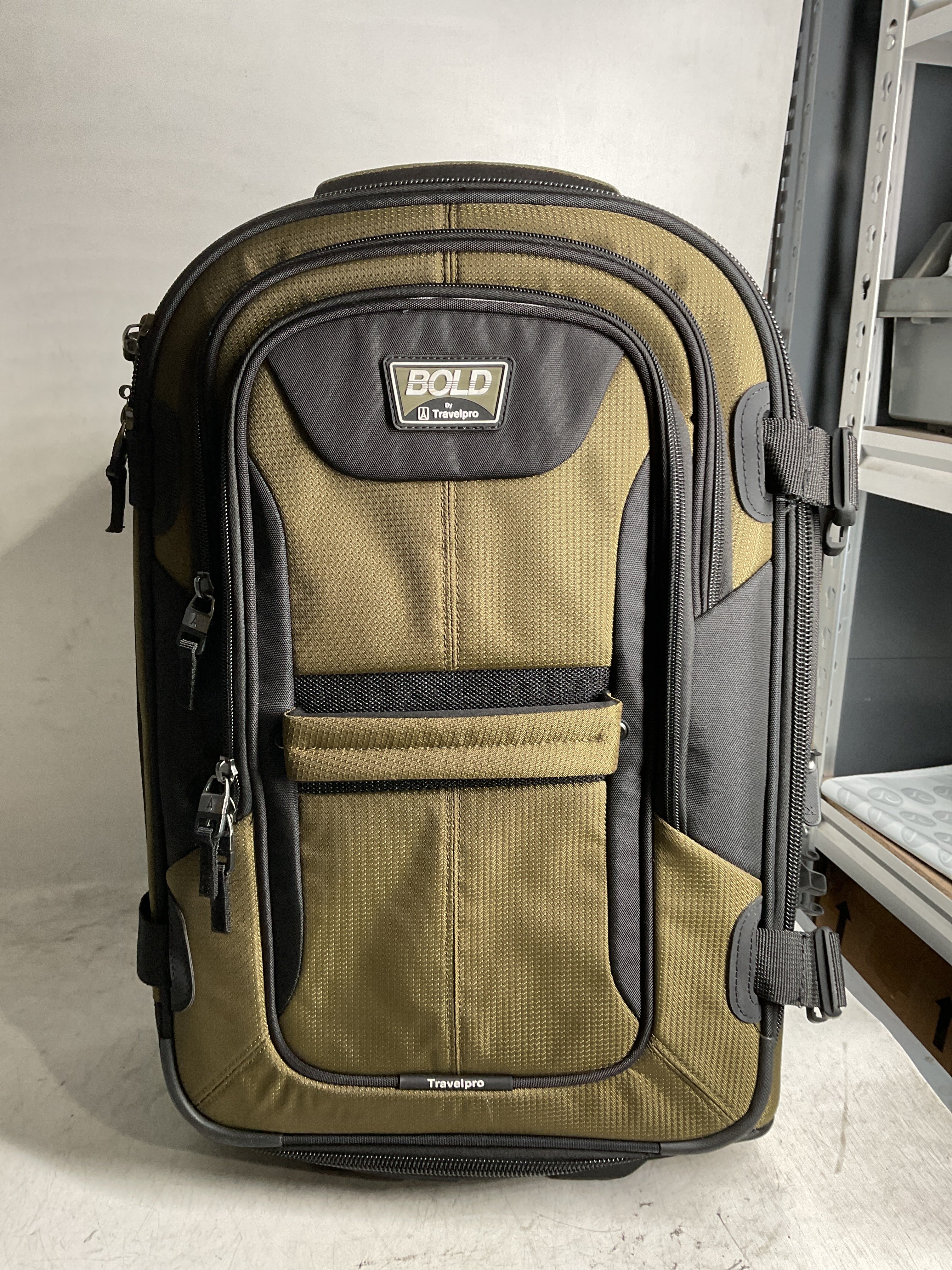 Travelpro Unisex-Adult Bold Softside Expandable Rollaboard Upright Luggage ( Olive/Black , Carry-On 22-Inch ) Olive/Black Carry On 22 Inch U5