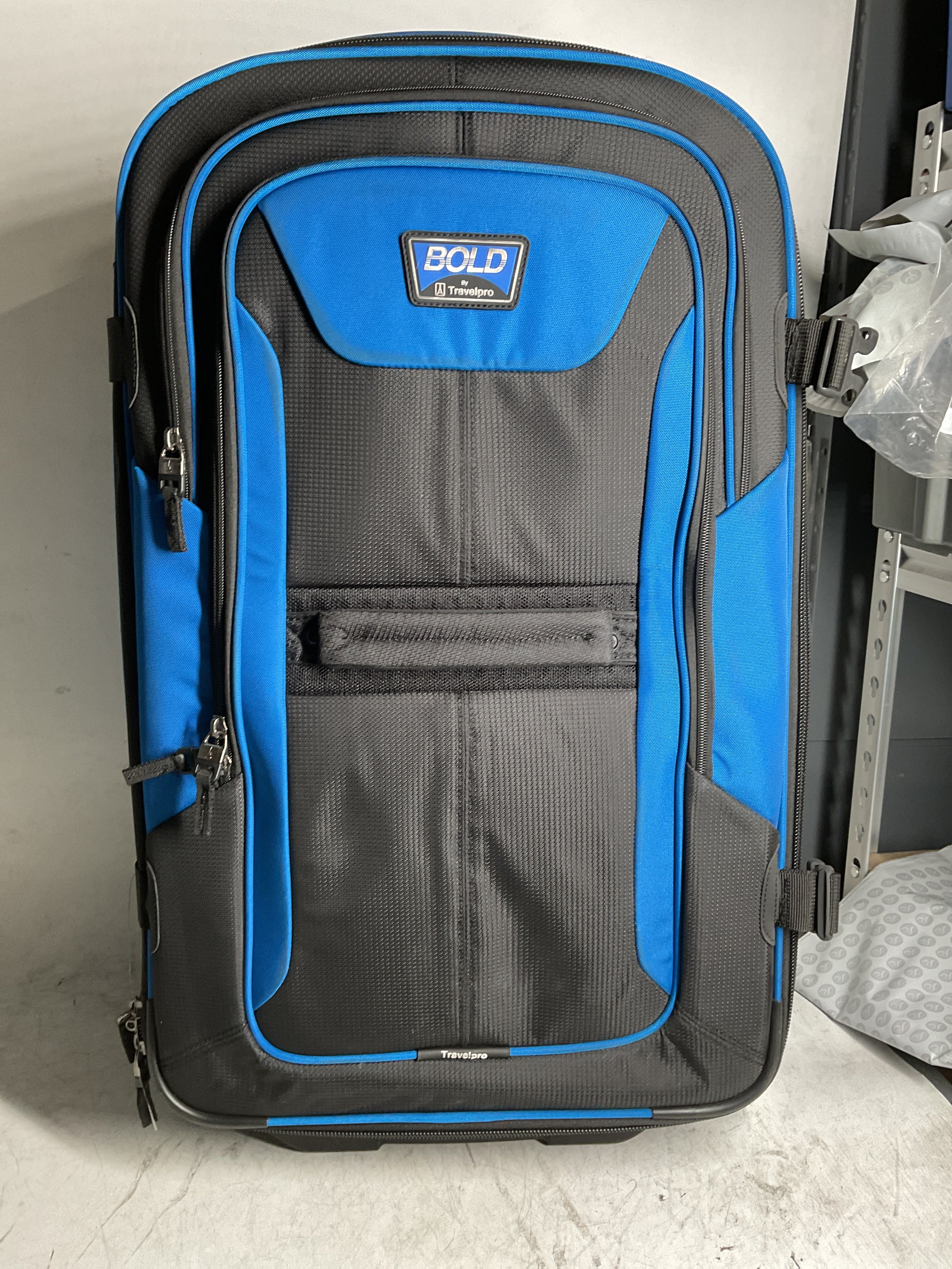 Travelpro Unisex-Adult Bold Softside Expandable Rollaboard Upright Luggage ( Blue/Black , Checked-Large 28-Inch ) Blue/Black Checked Large 28 Inch U2