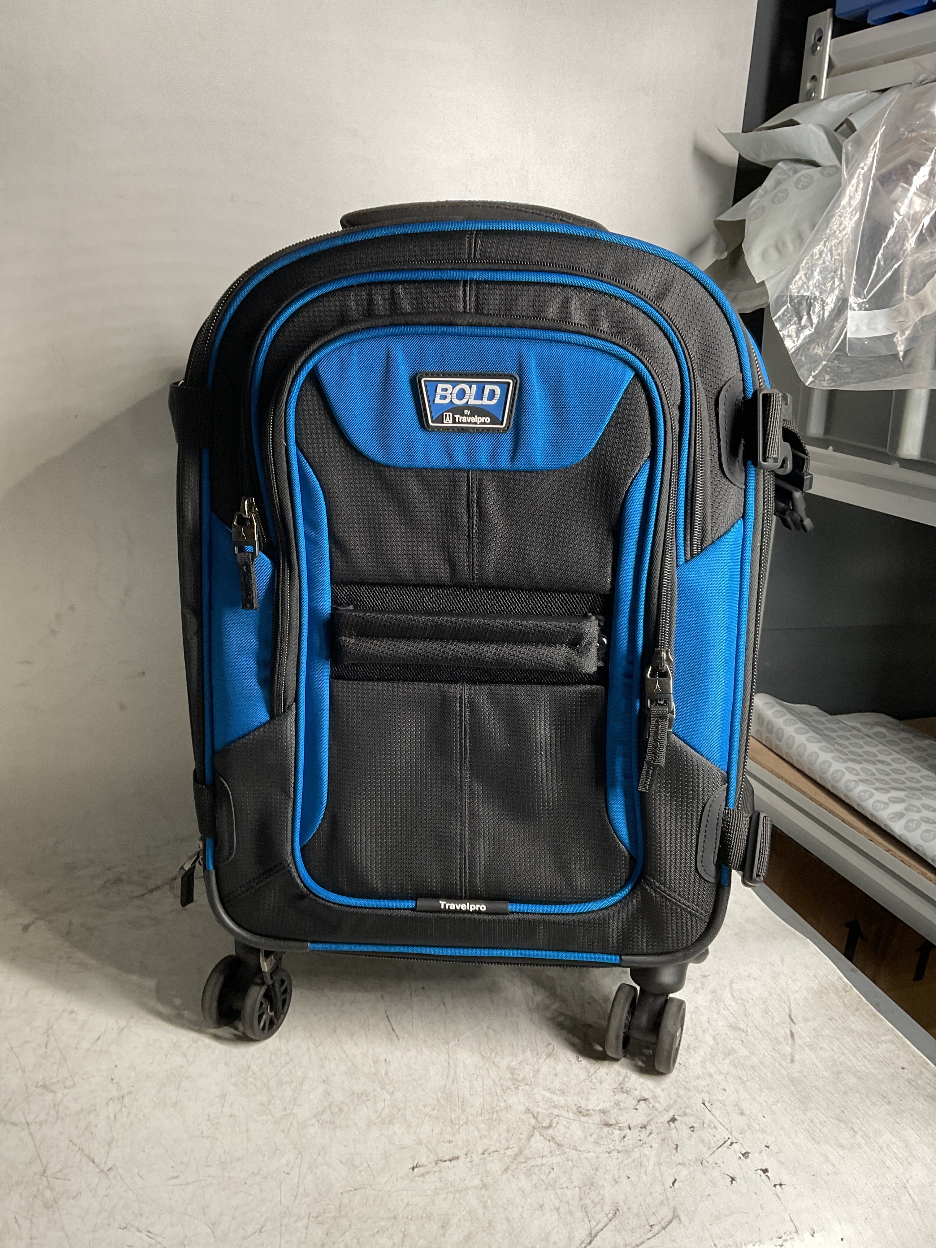 Travelpro Bold-Softside Expandable Luggage with Spinner Wheels ( Blue/Black , Carry-On 21-Inch ) Blue/Black Carry On 21 Inch U6