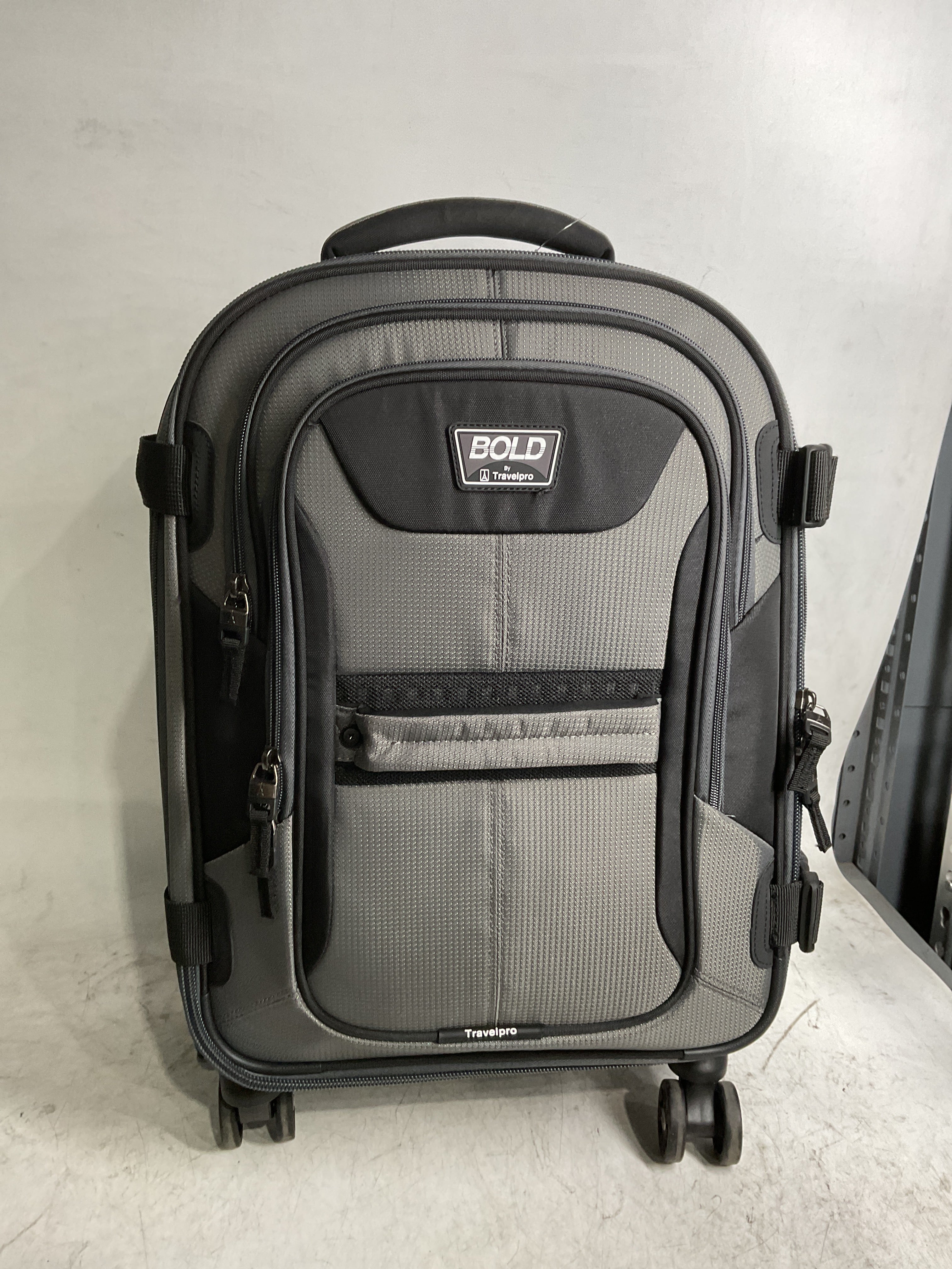 Travelpro Bold-Softside Expandable Luggage with Spinner Wheels ( Grey/Black , Carry-On 21-Inch ) Grey/Black Carry On 21 Inch U2