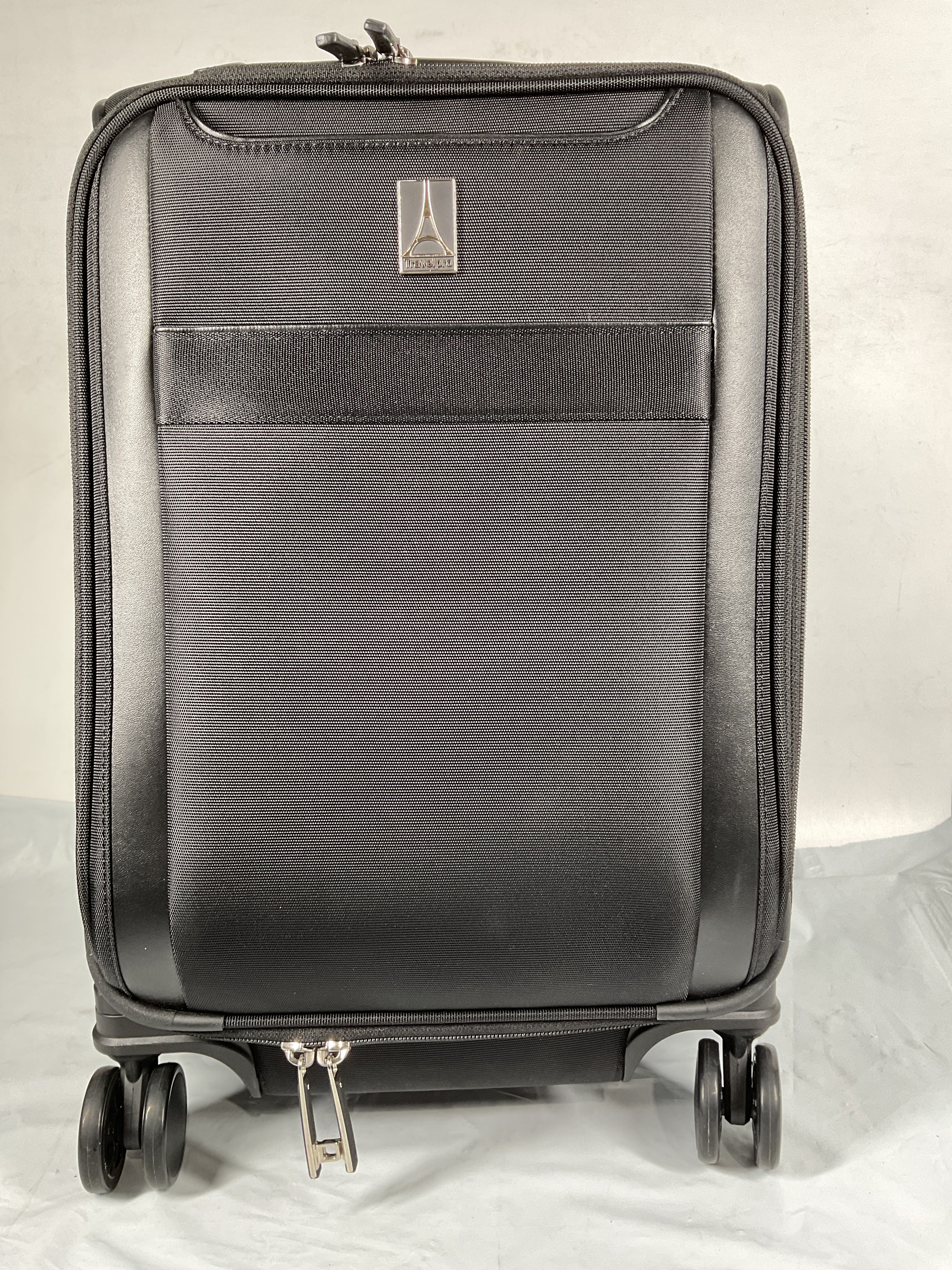 Travelpro Versapack + Lightweight Softside Expandable Checked Luggage, 8 Spinner Suitcase, TSA Lock, Men and Women ( Black , Compact Carry On ) Black Compact Carry On U2