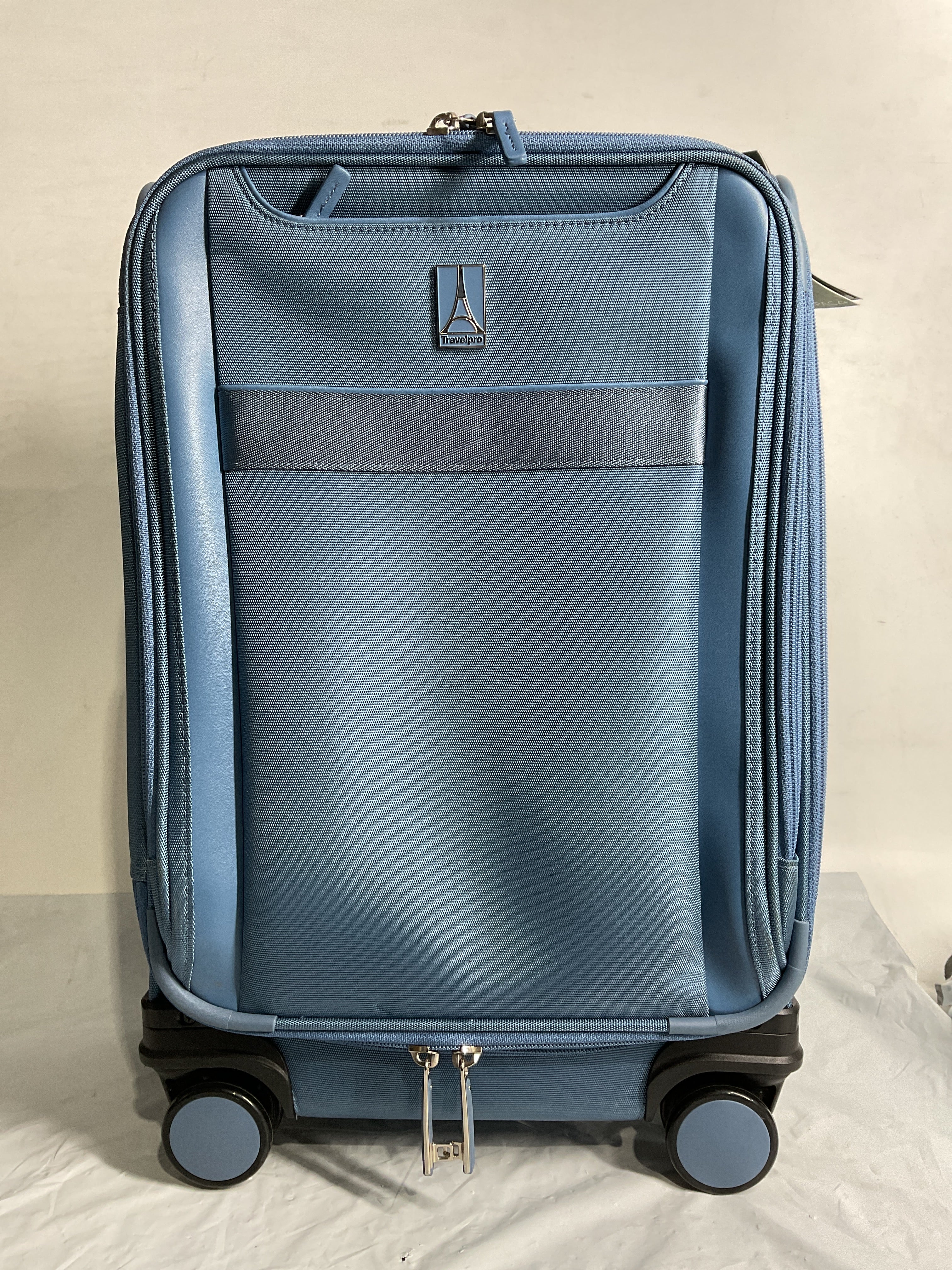 Travelpro Versapack + Lightweight Softside Expandable Checked Luggage, 8 Spinner Suitcase, TSA Lock, Men and Women ( Elemental Blue , Compact Carry On 20-Inch ) Elemental Blue Compact Carry On 20 Inch U2