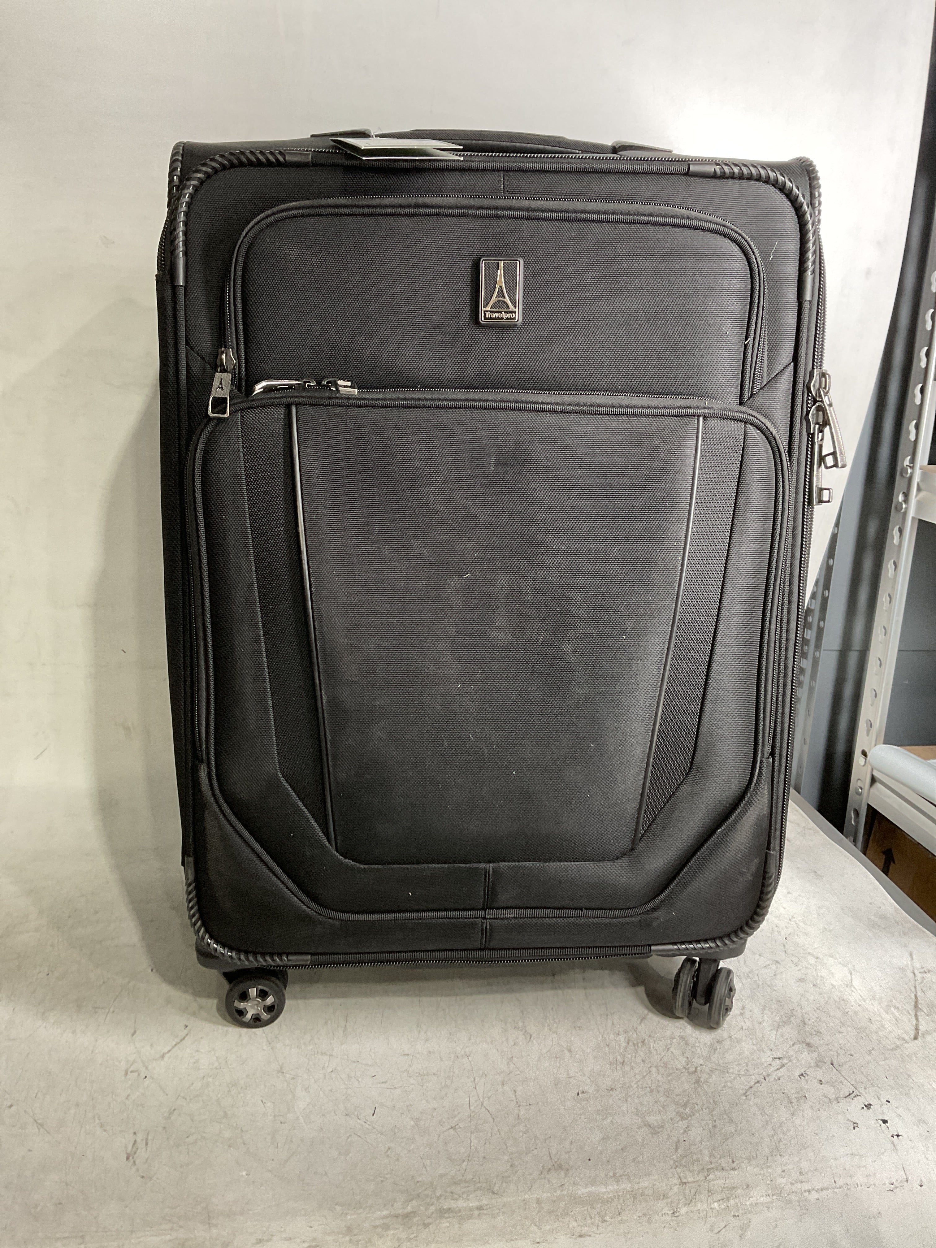 Travelpro Versapack + Lightweight Softside Expandable Checked Luggage, 8 Spinner Suitcase, TSA Lock, Men and Women ( Black , Checked Medium 25-Inch ) Black Checked Medium 25 Inch U2