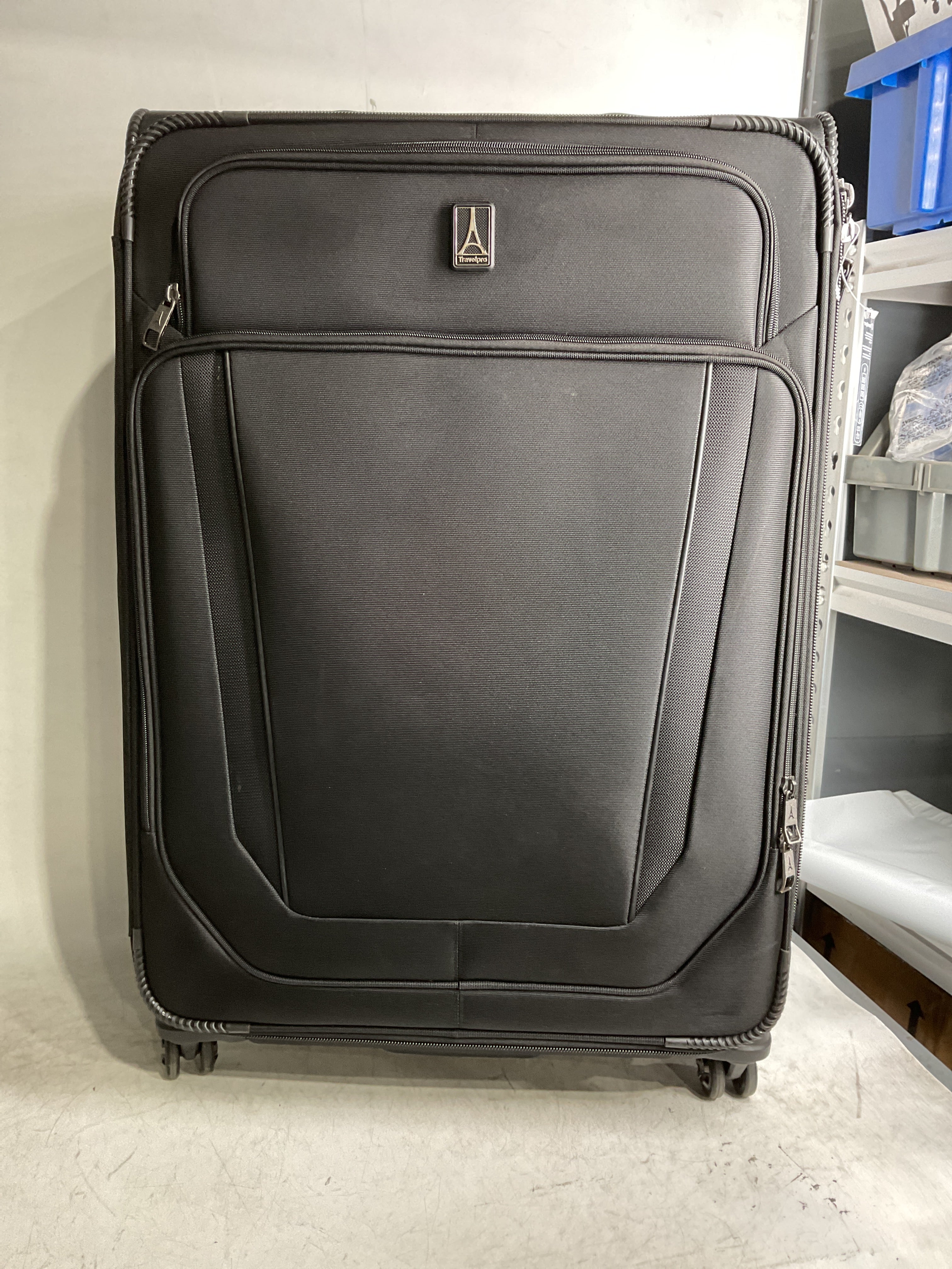 Travelpro Versapack + Lightweight Softside Expandable Checked Luggage, 8 Spinner Suitcase, TSA Lock, Men and Women ( Black , Checked Large 29-Inch ) Black Checked Large 29 Inch U1