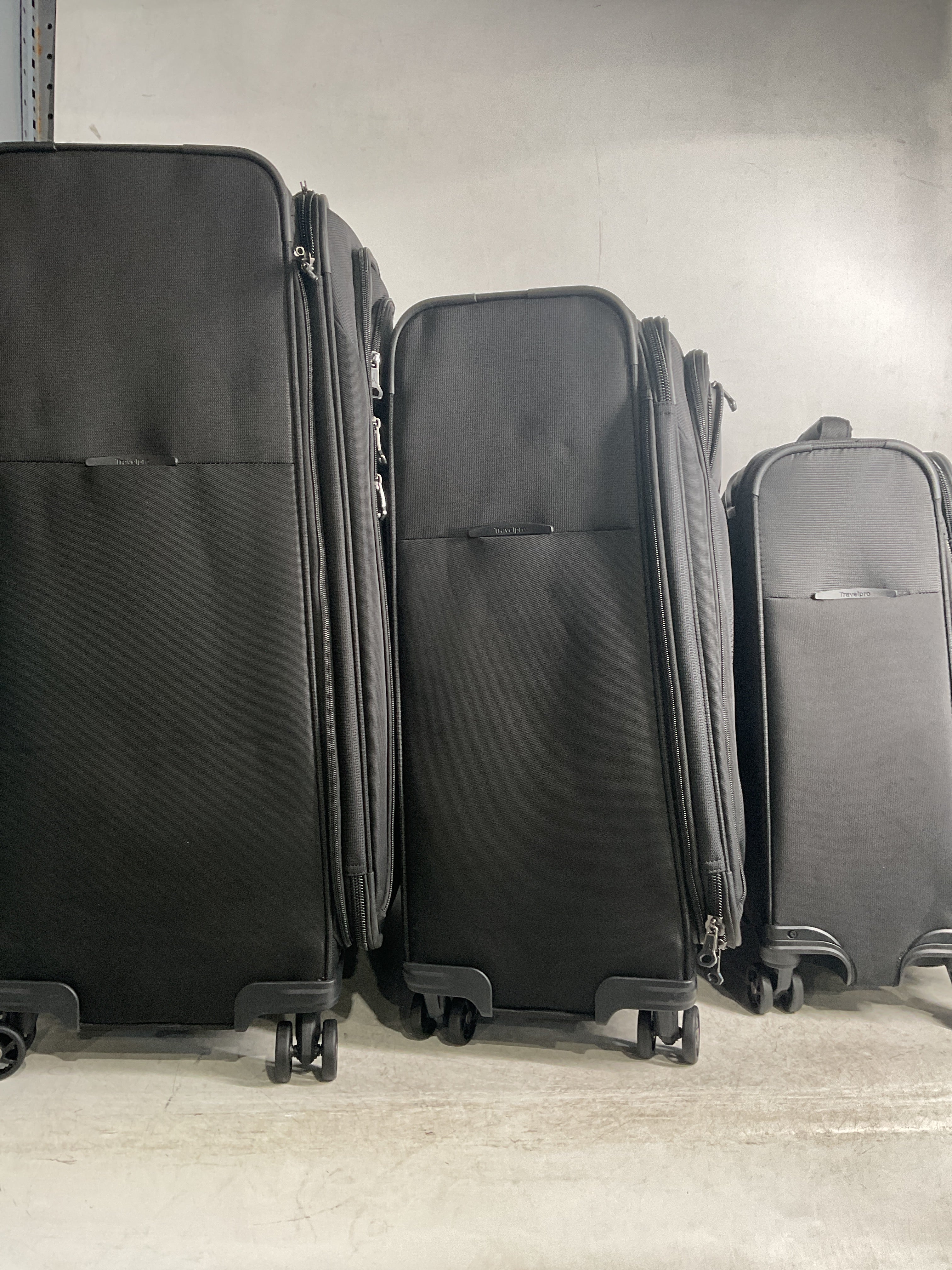 Travelpro Tourlite Softside Expandable Luggage with 4 Spinner Wheels, Lightweight Suitcase, Men and Women ( Black , 3-Piece Set (21/25/29) ) Black 3 Piece Set 21 25 29 U1
